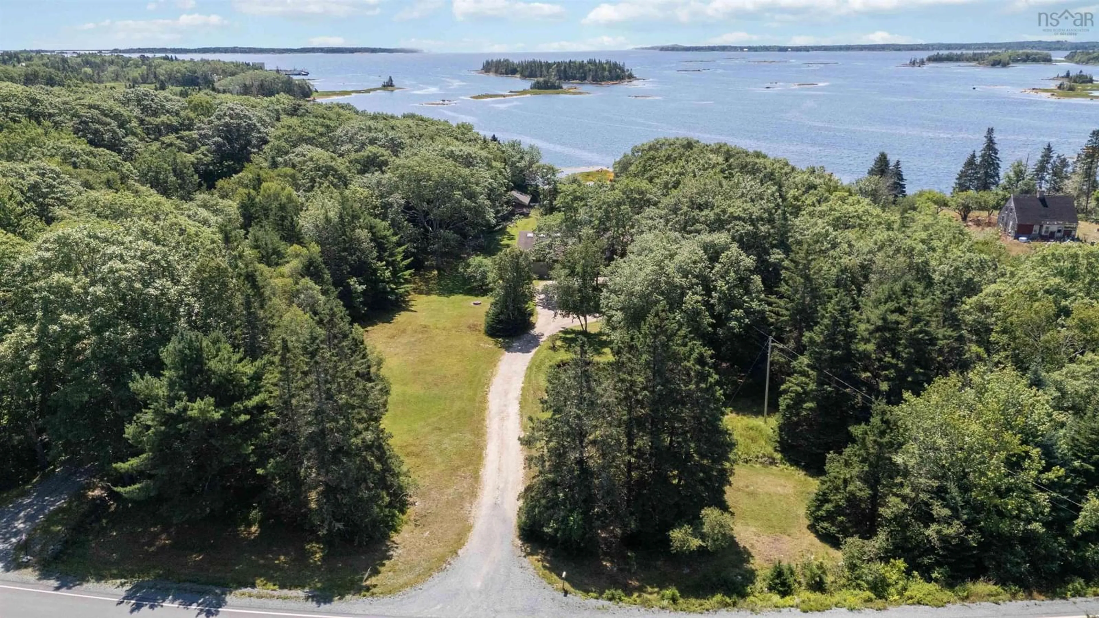 A pic from outside/outdoor area/front of a property/back of a property/a pic from drone, water/lake/river/ocean view for 9169 Highway 331, Voglers Cove Nova Scotia B0J 2H0