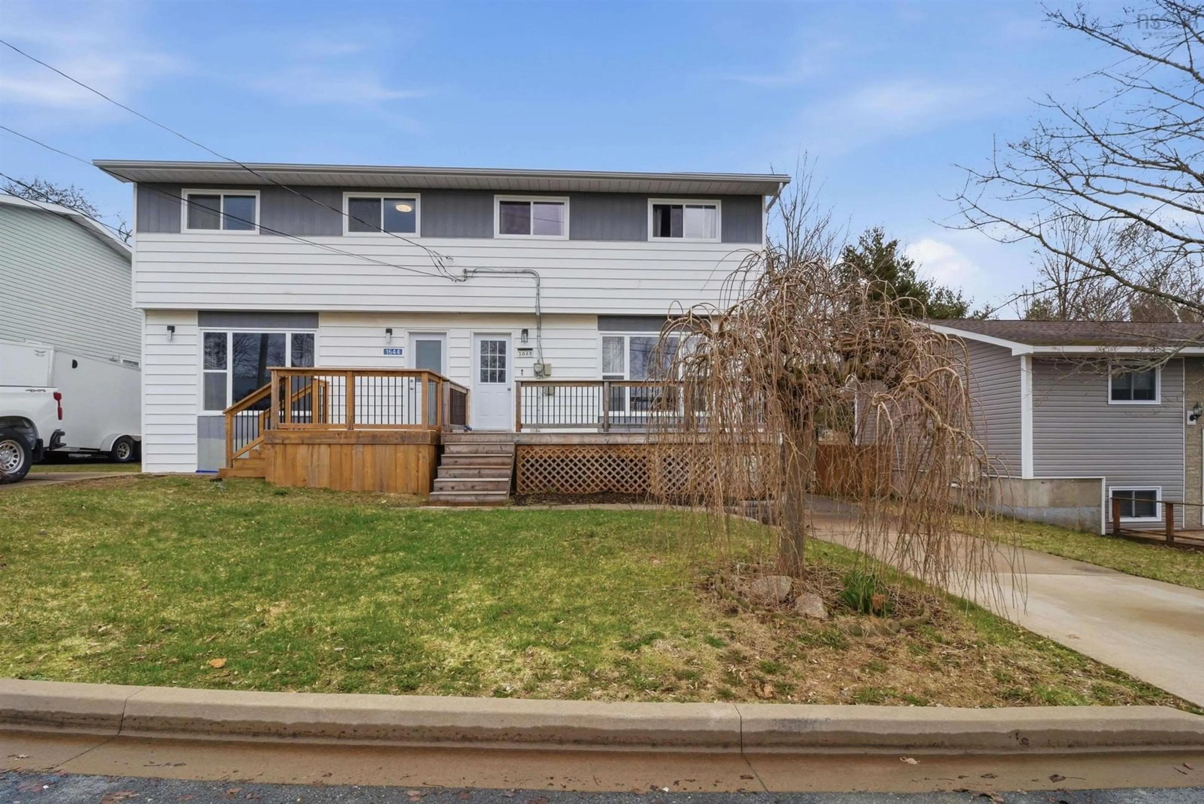 A pic from outside/outdoor area/front of a property/back of a property/a pic from drone, street for 1648 Riverside Dr, Lower Sackville Nova Scotia B4C 2Y8