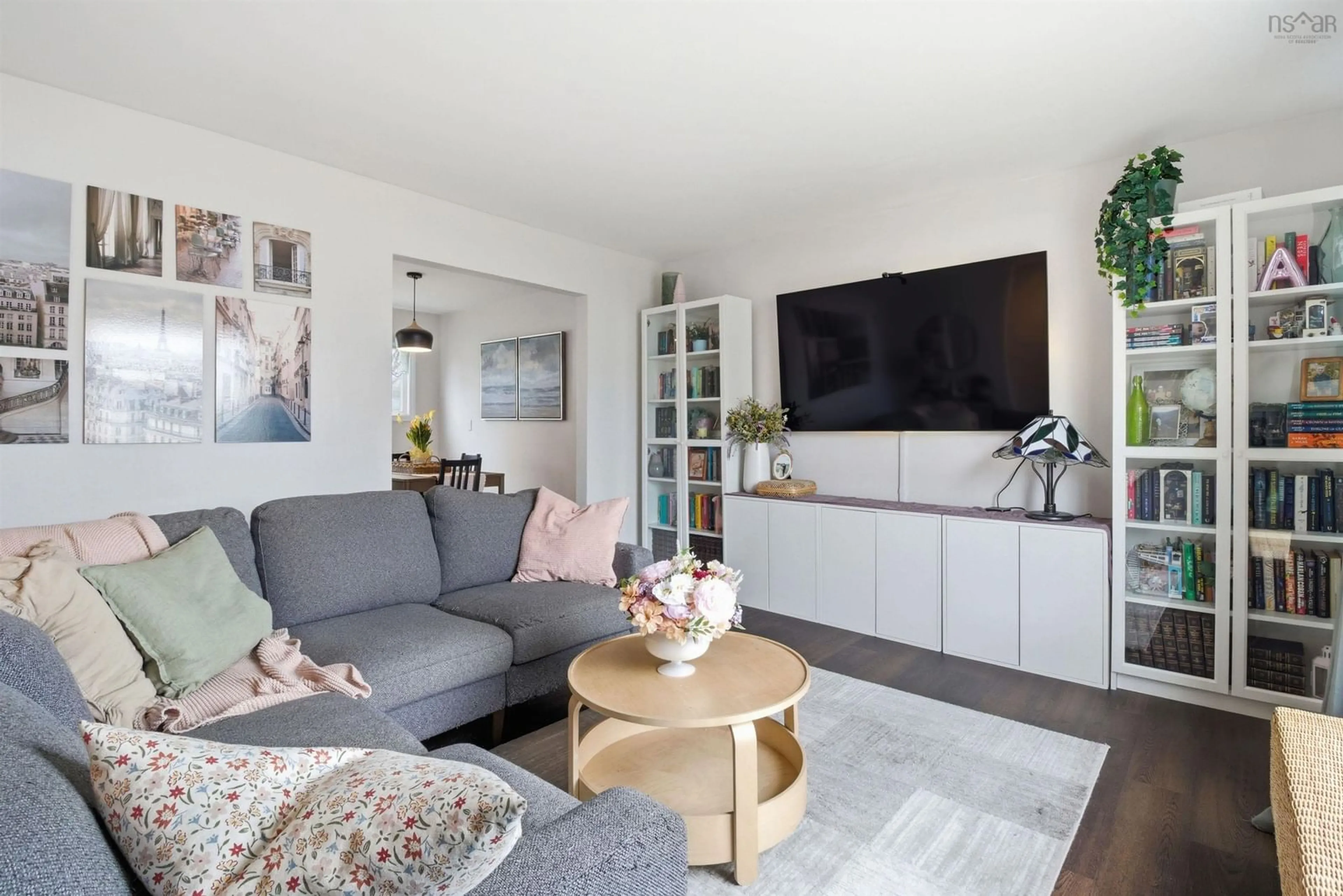 Living room with furniture, wood/laminate floor for 1648 Riverside Dr, Lower Sackville Nova Scotia B4C 2Y8