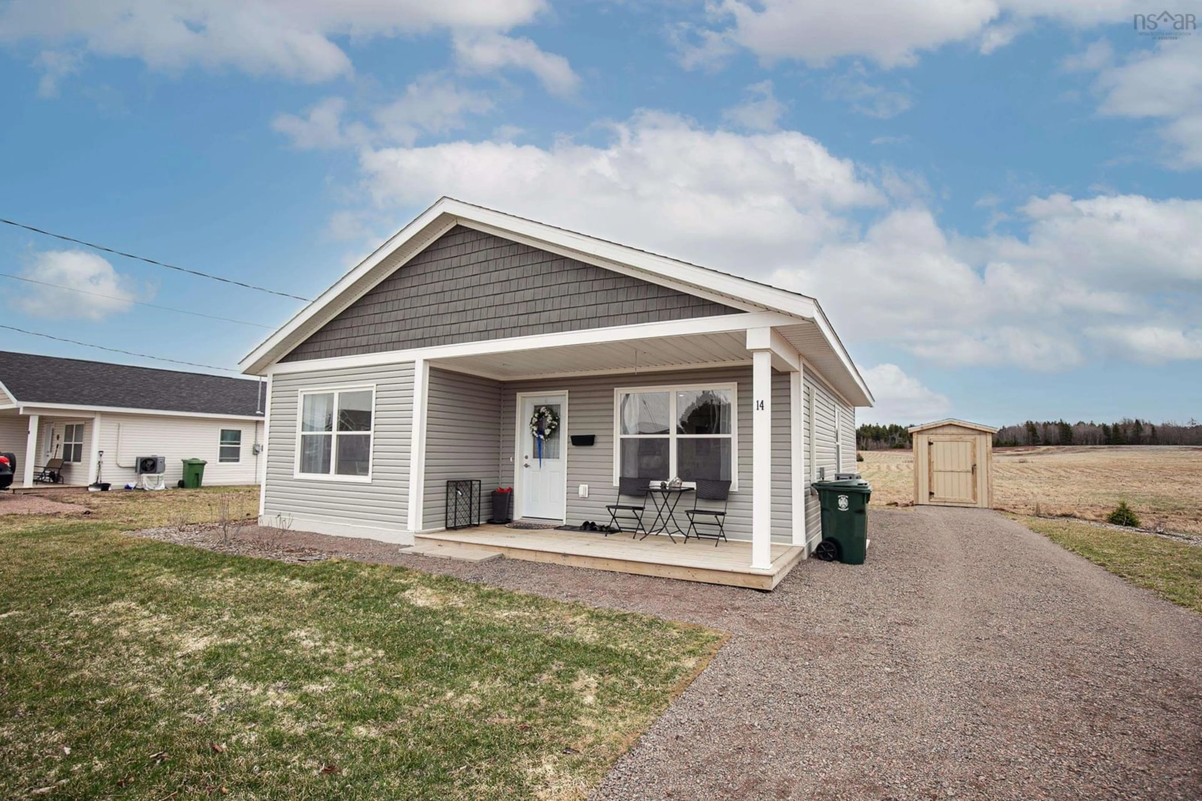 Home with vinyl exterior material, street for 14 Fleming St, Amherst Nova Scotia B4H 0C3