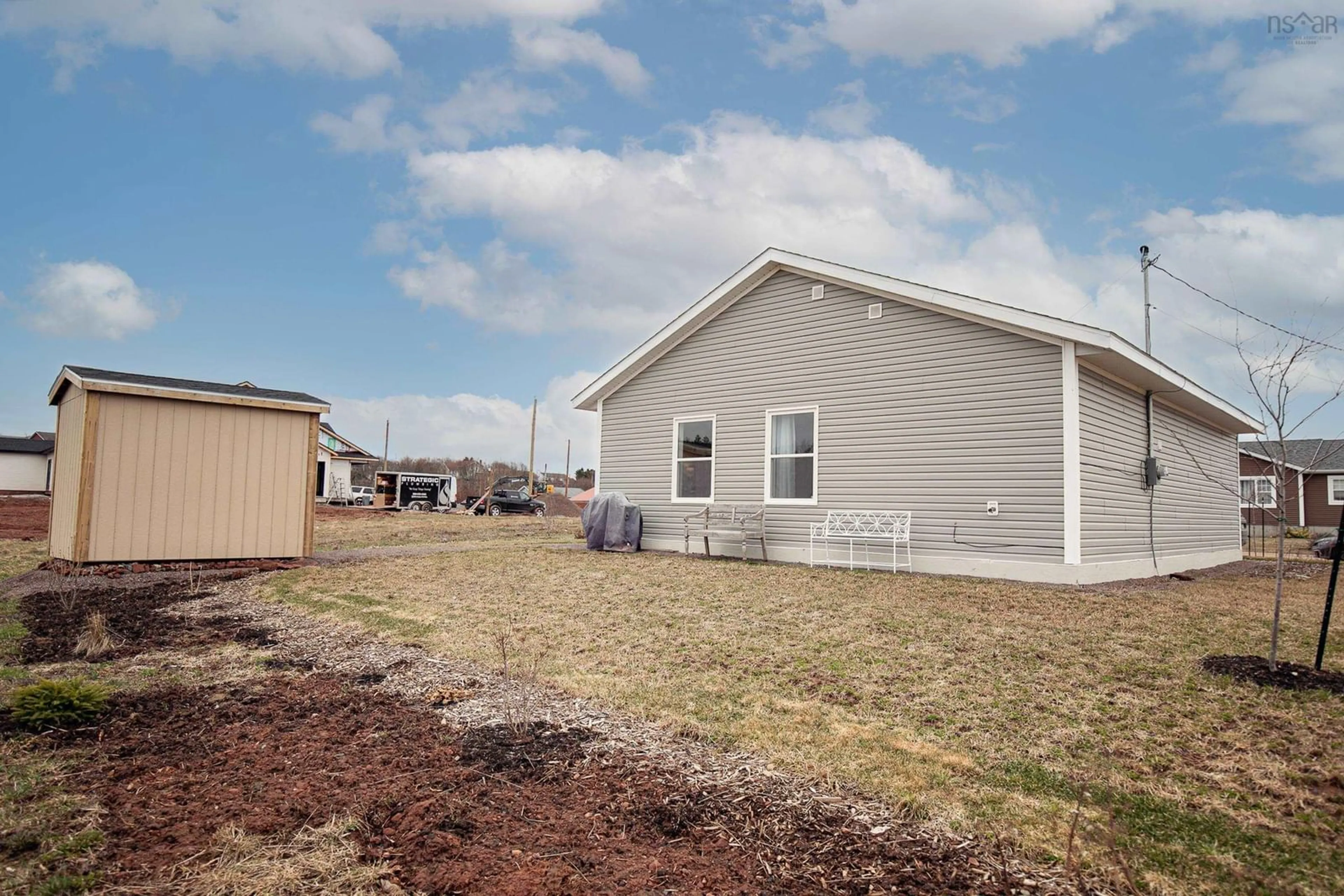 Home with vinyl exterior material, street for 14 Fleming St, Amherst Nova Scotia B4H 0C3