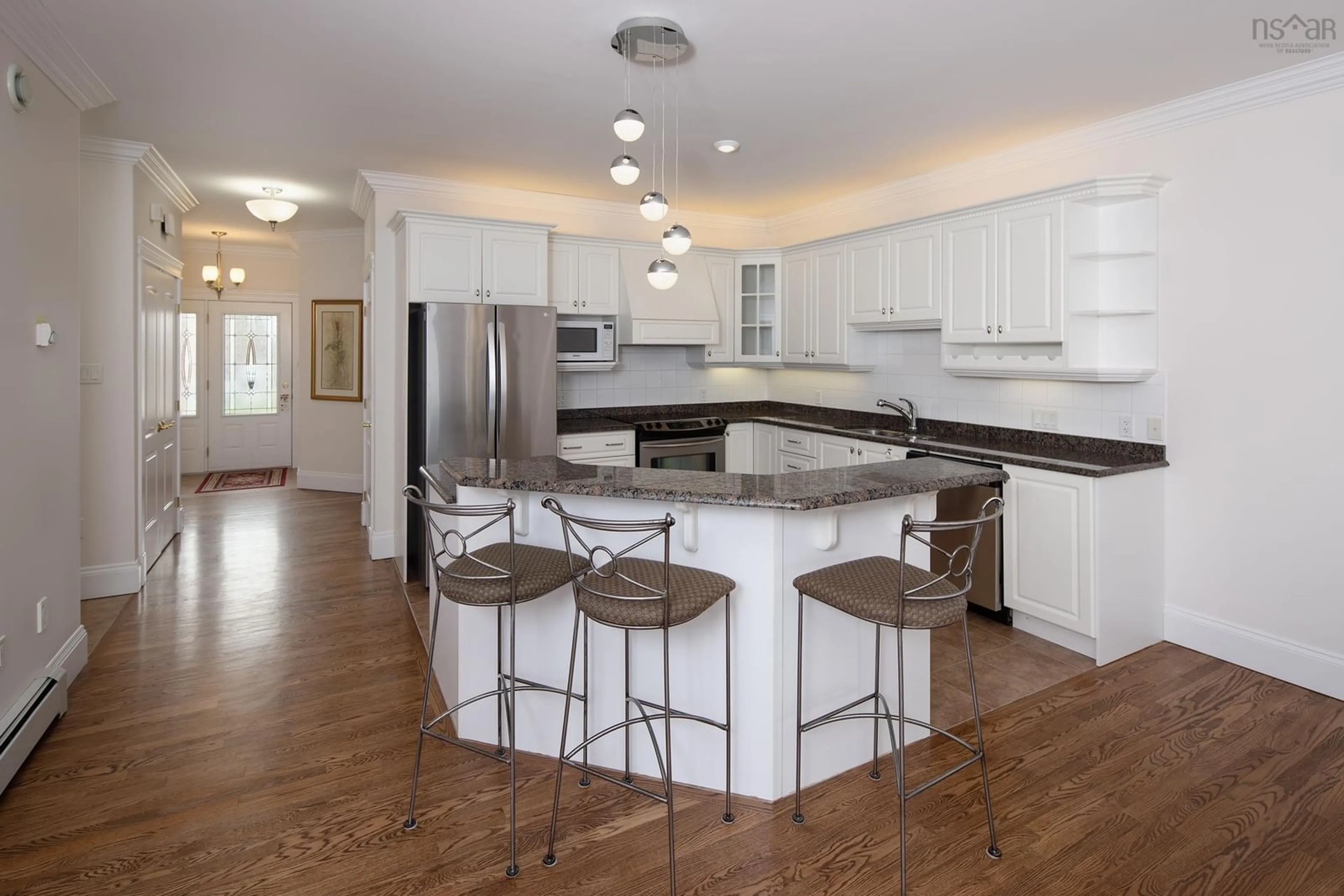 Open concept kitchen, wood/laminate floor for 44 Kirkwood Crt, Bedford Nova Scotia B4A 0A8