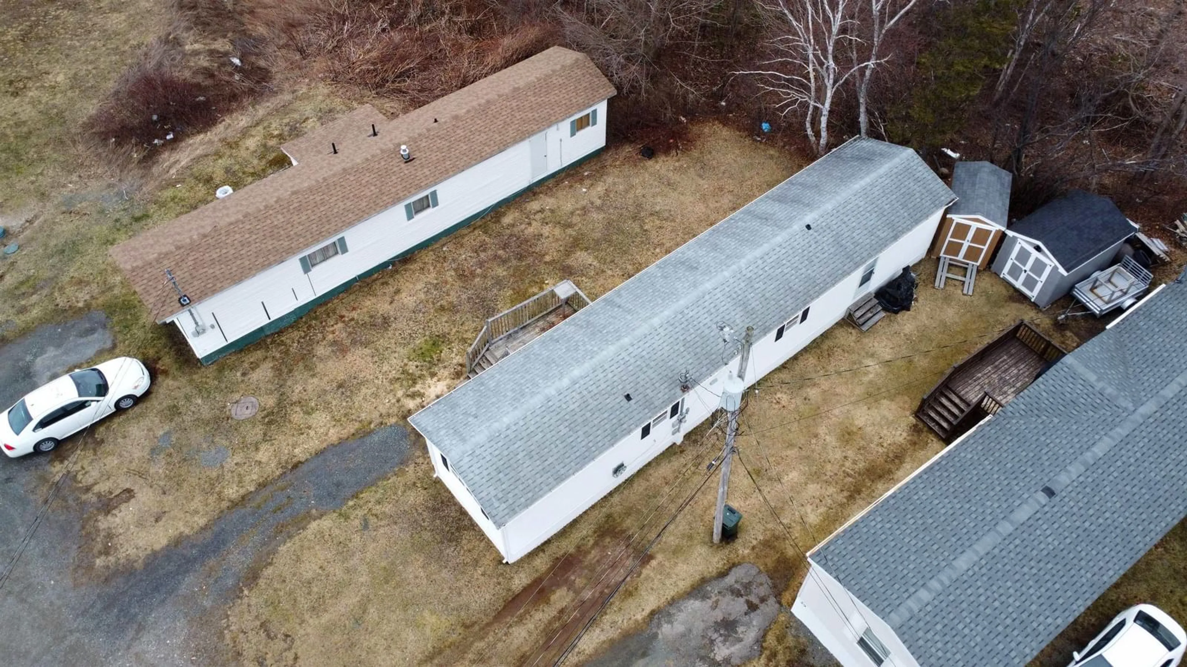 A pic from outside/outdoor area/front of a property/back of a property/a pic from drone, building for 27 Curry St., Howie Centre Nova Scotia B1L 1G3