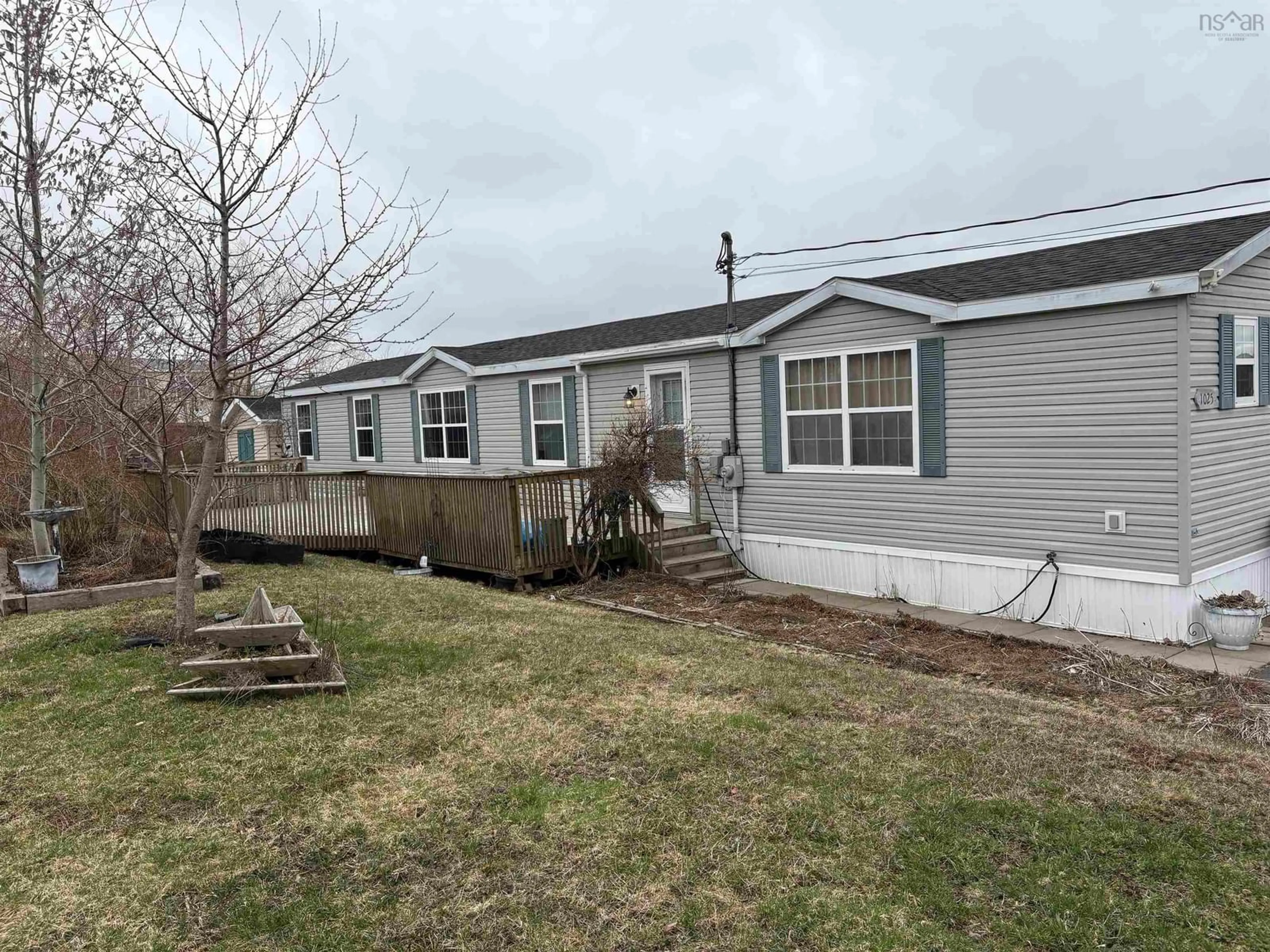 Home with vinyl exterior material, street for 1025 Park Lane, Westville Nova Scotia B0K 2A0