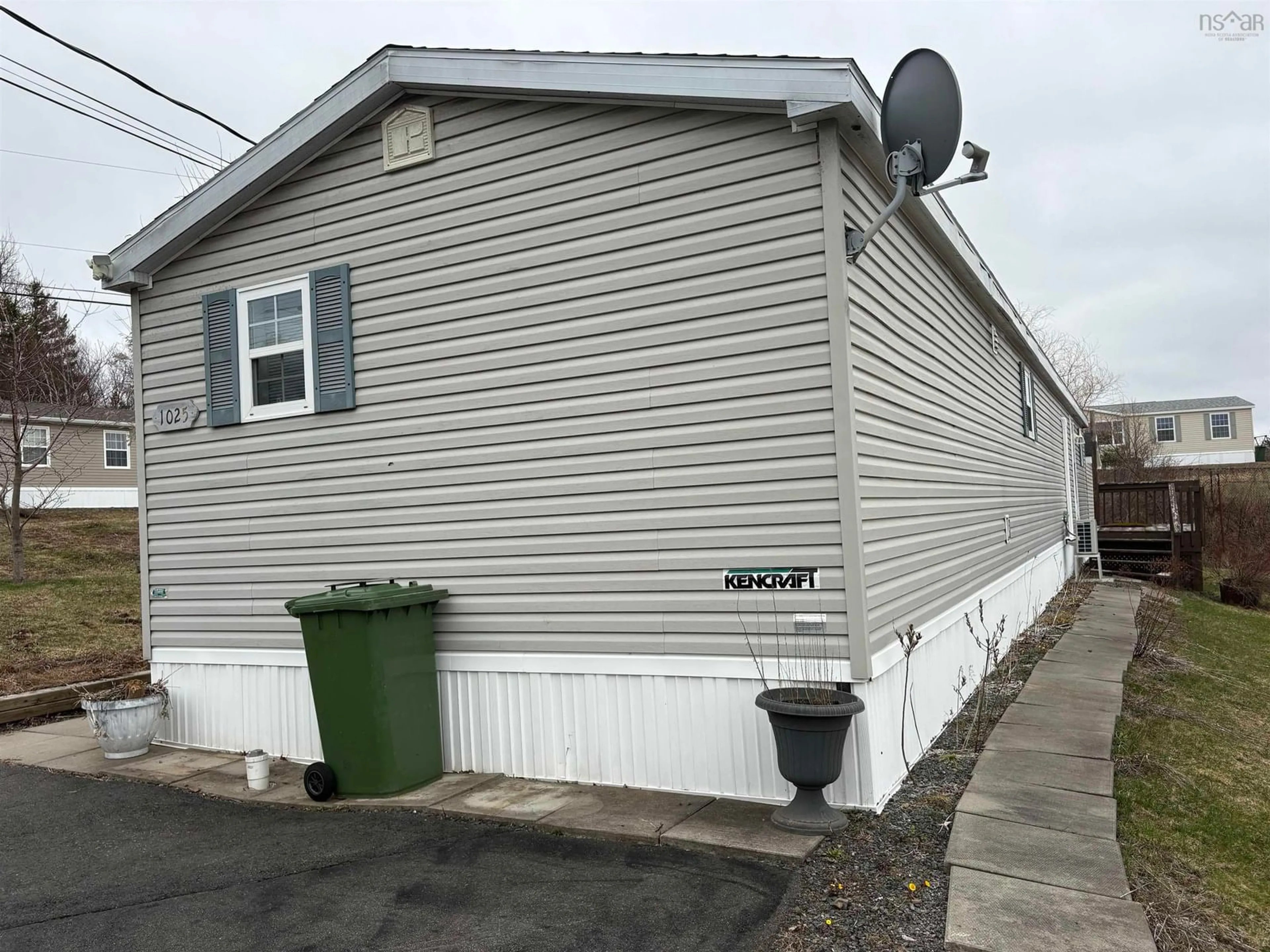 Home with vinyl exterior material, street for 1025 Park Lane, Westville Nova Scotia B0K 2A0