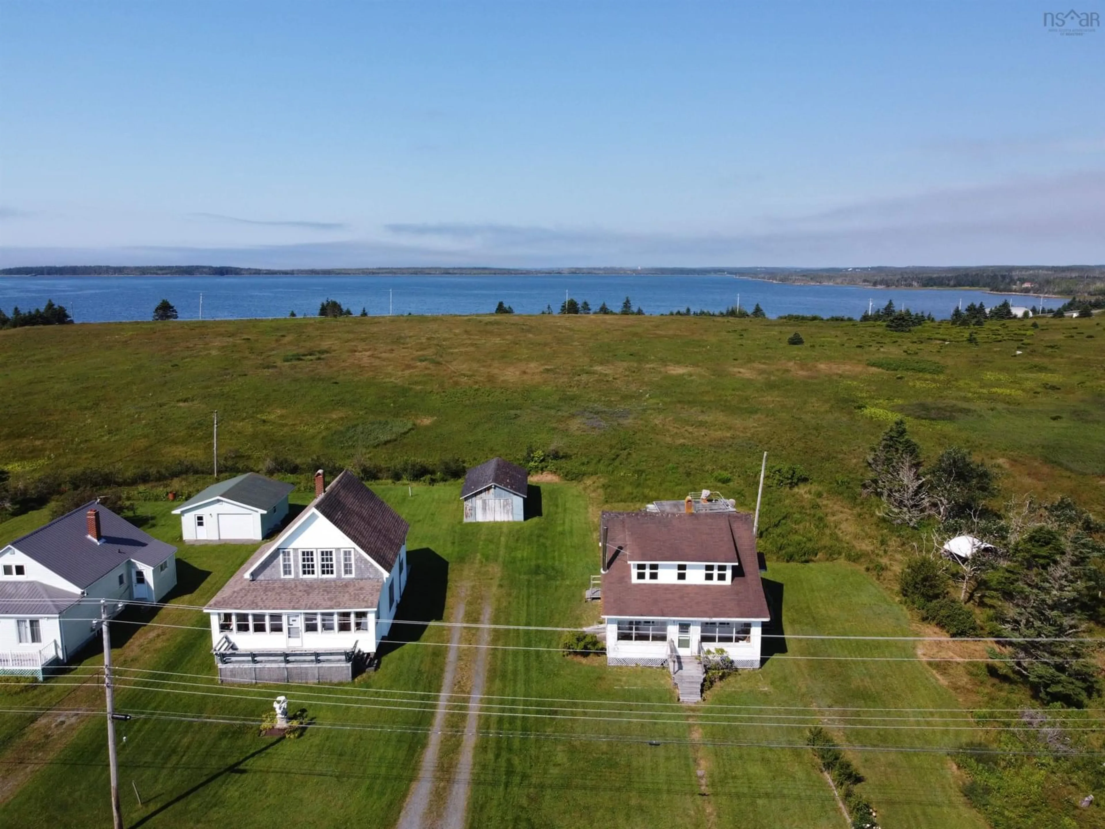 A pic from outside/outdoor area/front of a property/back of a property/a pic from drone, water/lake/river/ocean view for 1609&1613 Highway 7 & Turners Island, Marie Joseph Nova Scotia B0J 2G0