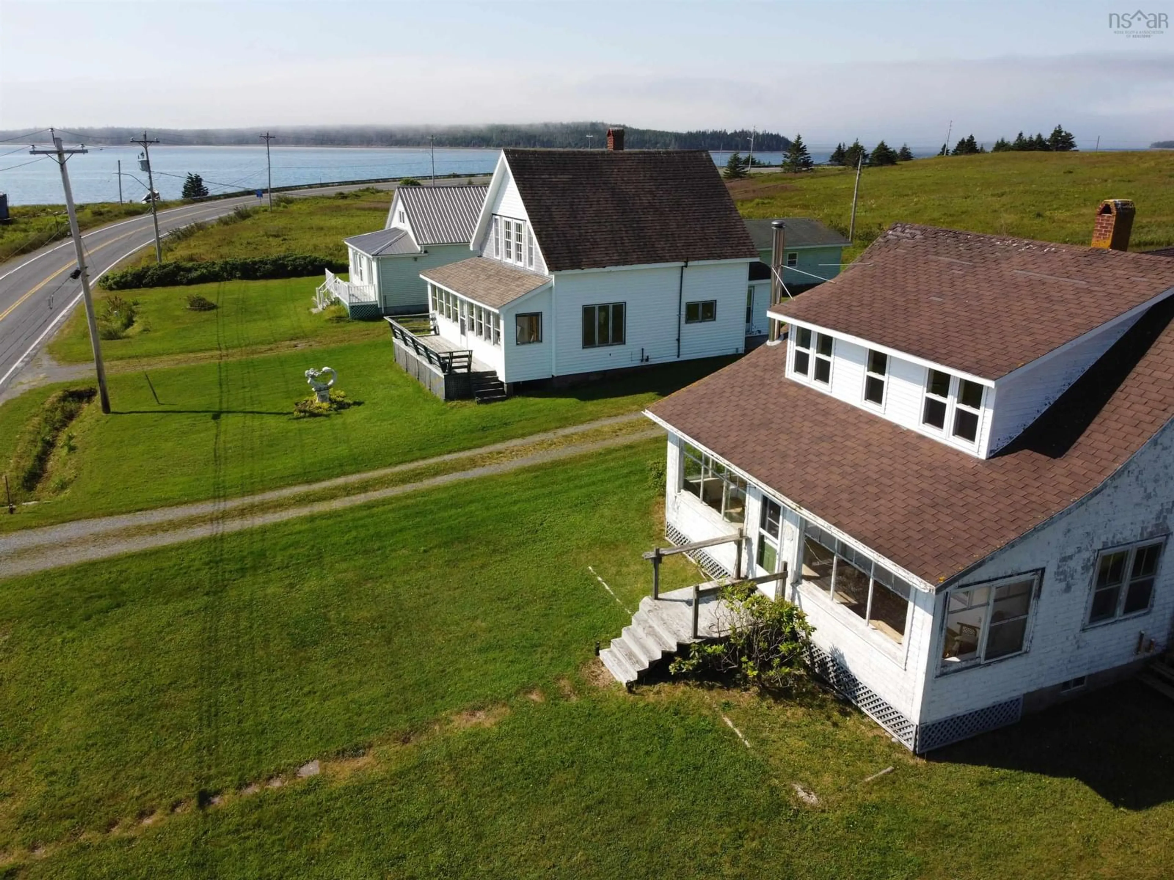A pic from outside/outdoor area/front of a property/back of a property/a pic from drone, water/lake/river/ocean view for 1609&1613 Highway 7 & Turners Island, Marie Joseph Nova Scotia B0J 2G0