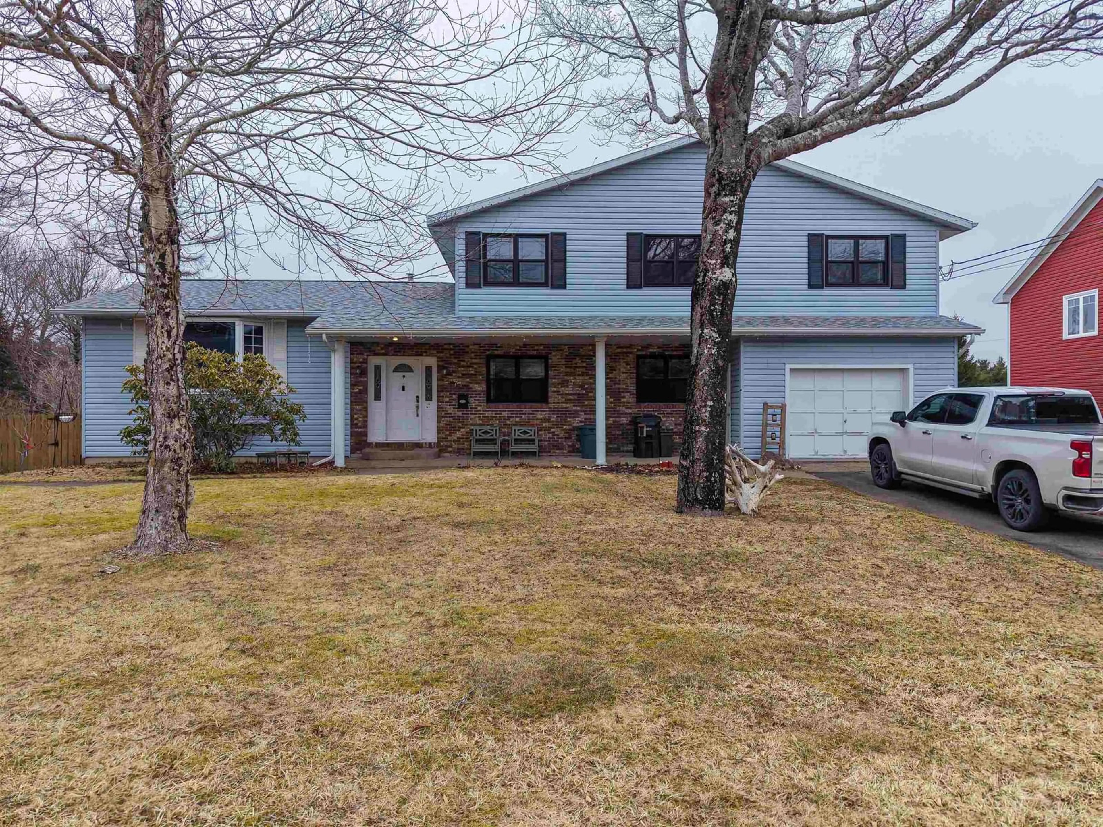 A pic from outside/outdoor area/front of a property/back of a property/a pic from drone, street for 57 Bardmoor Cres, Sydney River Nova Scotia B1S 3J7