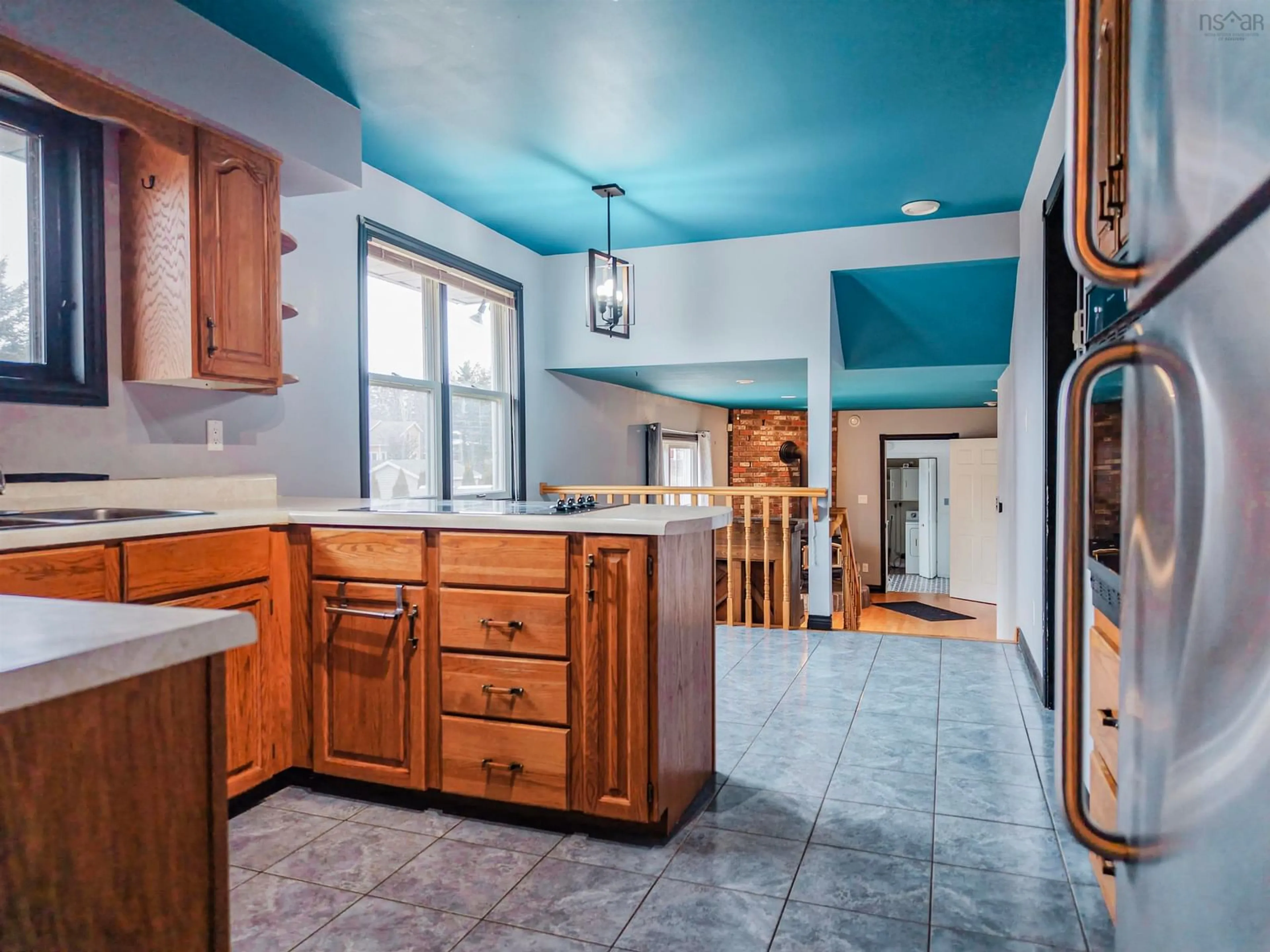 Open concept kitchen, ceramic/tile floor for 57 Bardmoor Cres, Sydney River Nova Scotia B1S 3J7