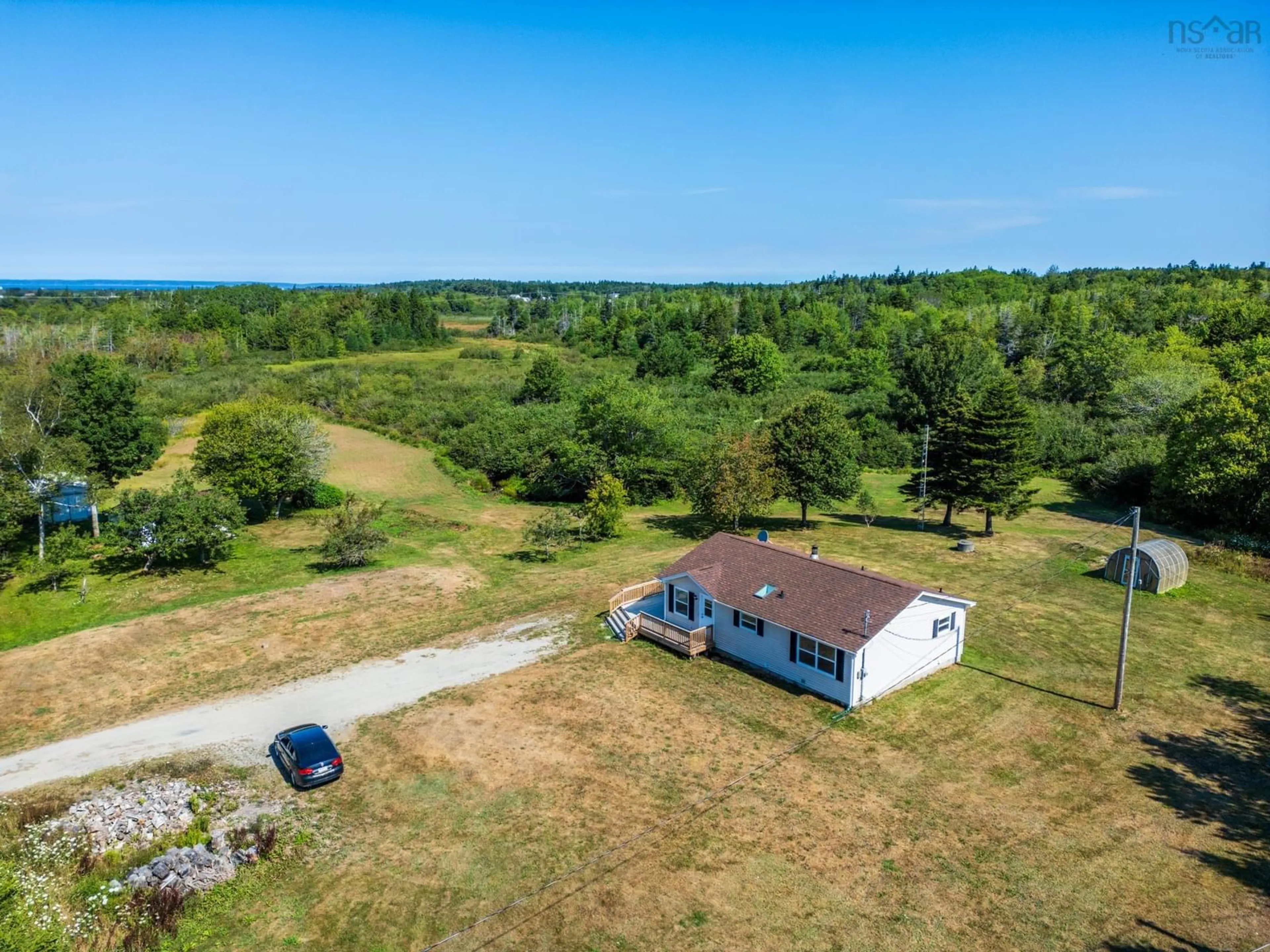 A pic from outside/outdoor area/front of a property/back of a property/a pic from drone, unknown for 361 Amirault Road, Saulnierville Nova Scotia B0W 2Z0