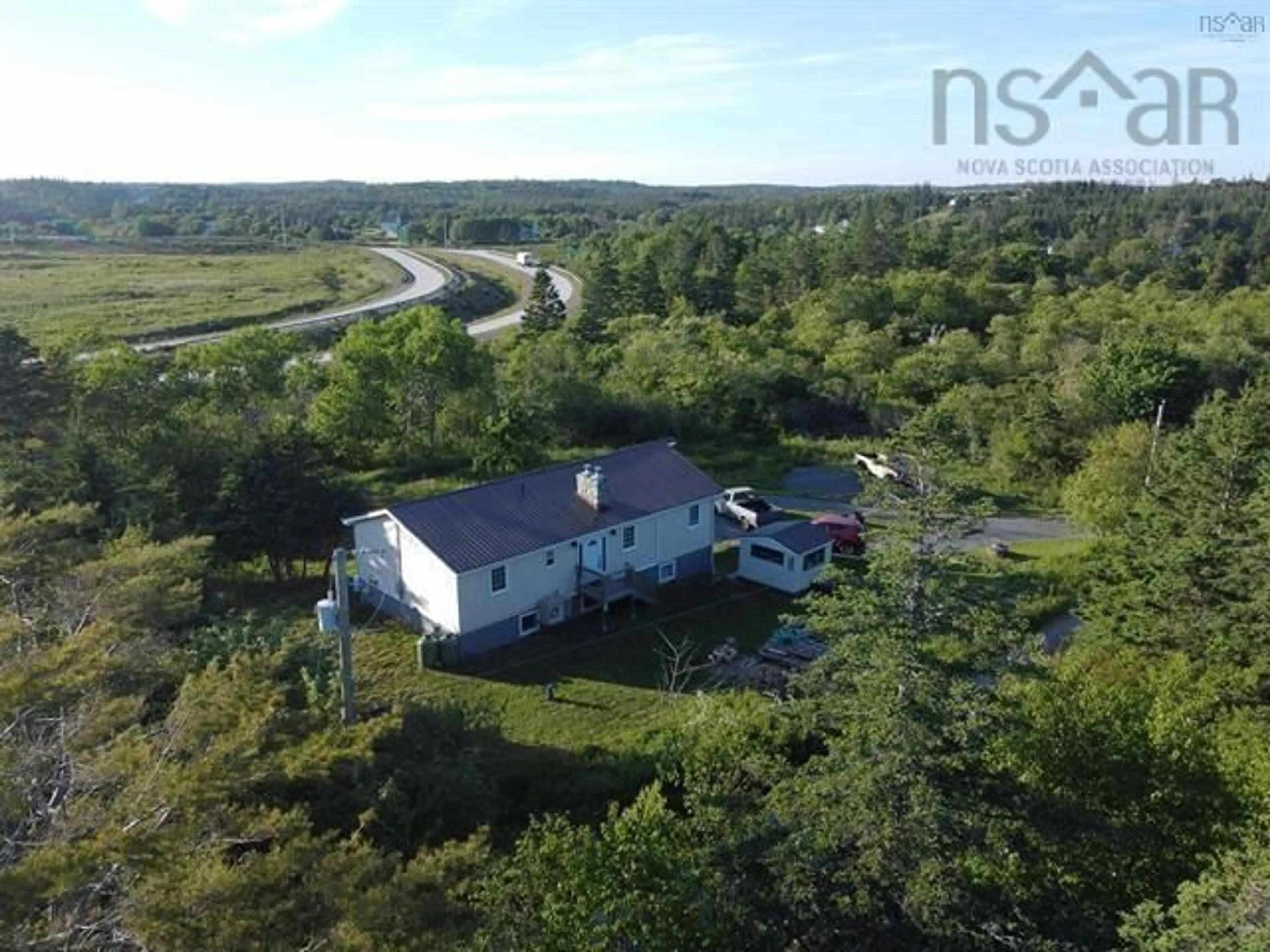 A pic from outside/outdoor area/front of a property/back of a property/a pic from drone, water/lake/river/ocean view for 62 Lake Doucette Rd, Lake Doucette Nova Scotia B0W 2Y0