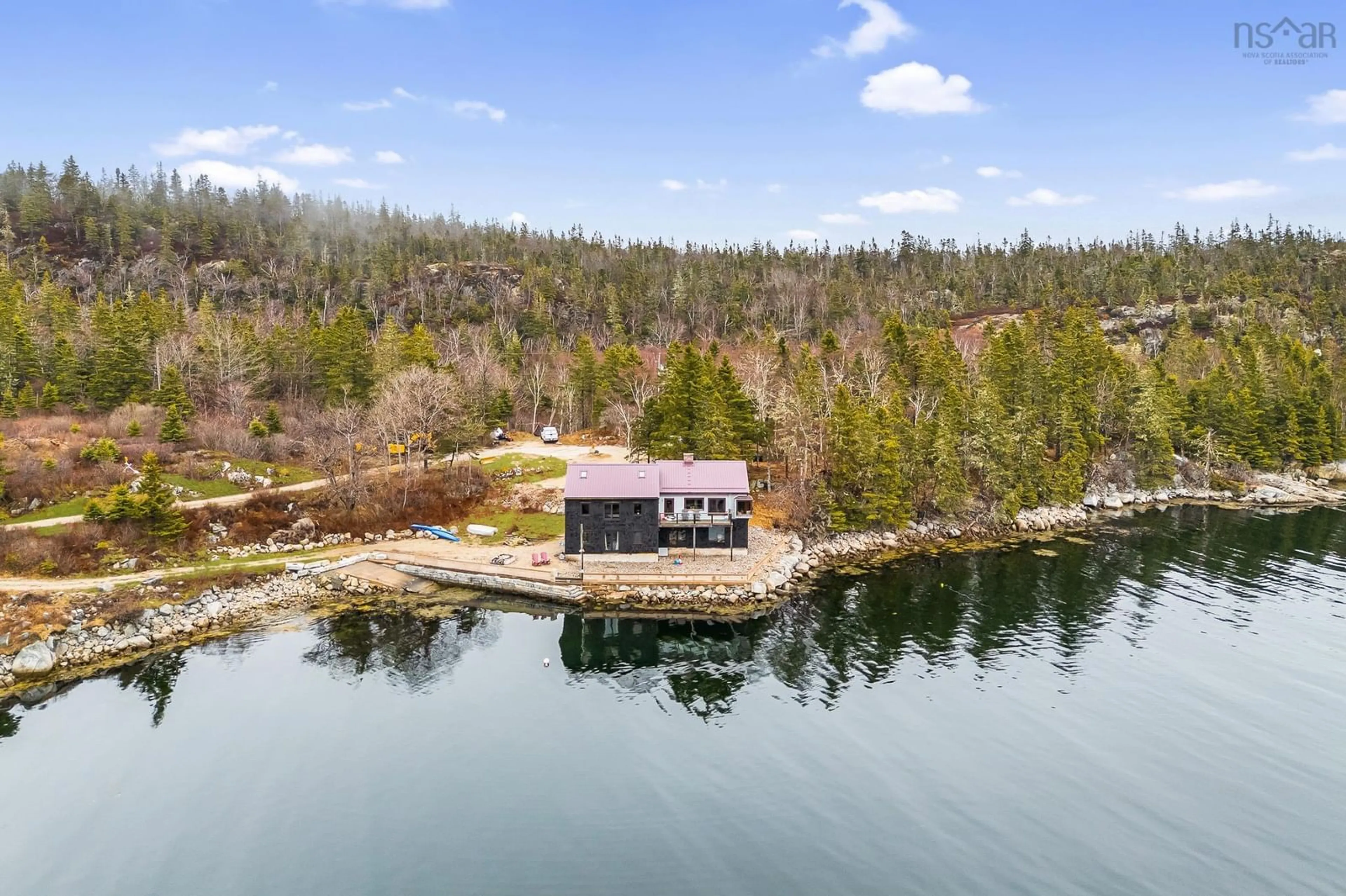 A pic from outside/outdoor area/front of a property/back of a property/a pic from drone, water/lake/river/ocean view for 3087 Highway 329, Northwest Cove Nova Scotia B0J 1T0
