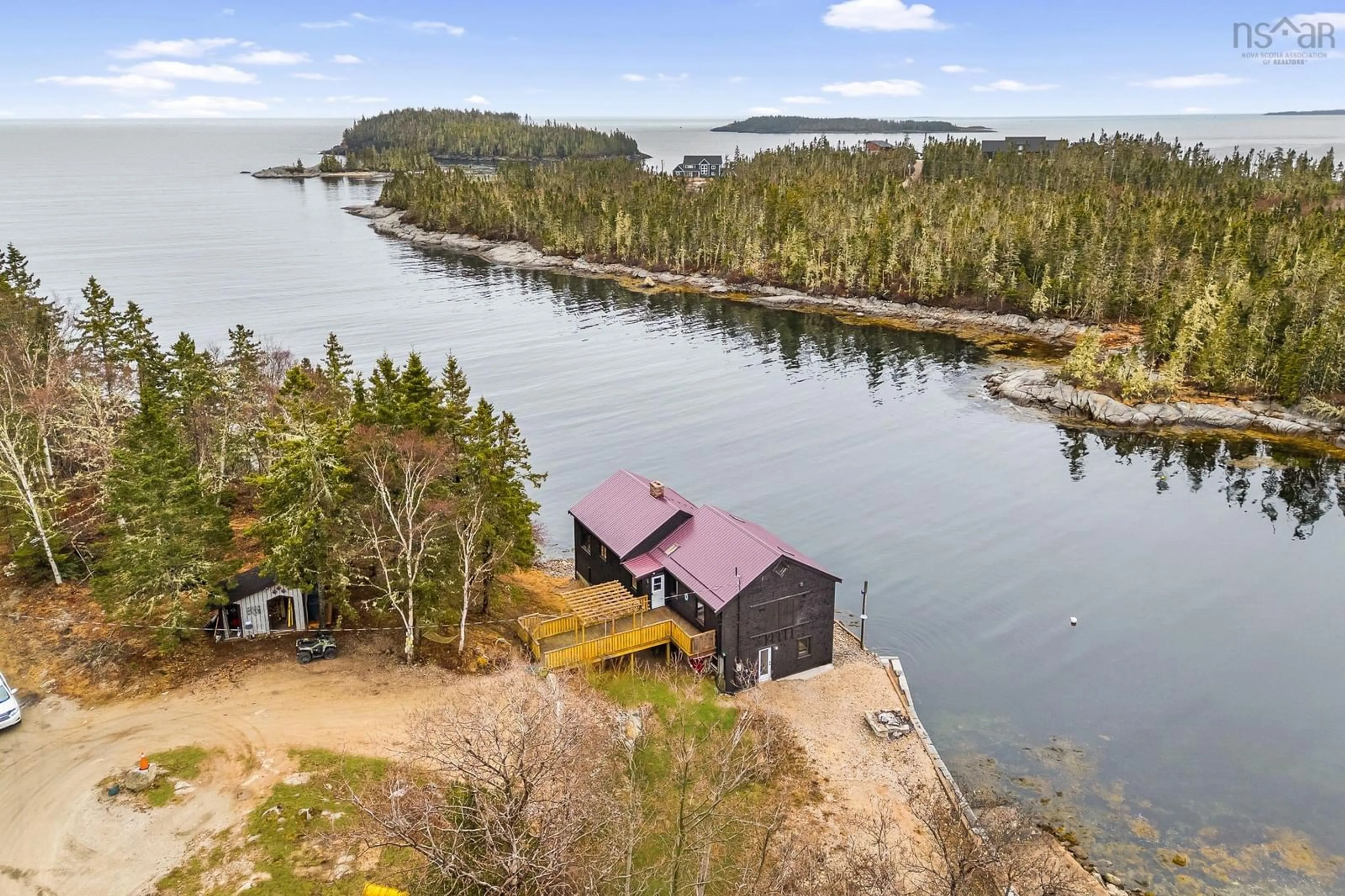 A pic from outside/outdoor area/front of a property/back of a property/a pic from drone, water/lake/river/ocean view for 3087 Highway 329, Northwest Cove Nova Scotia B0J 1T0