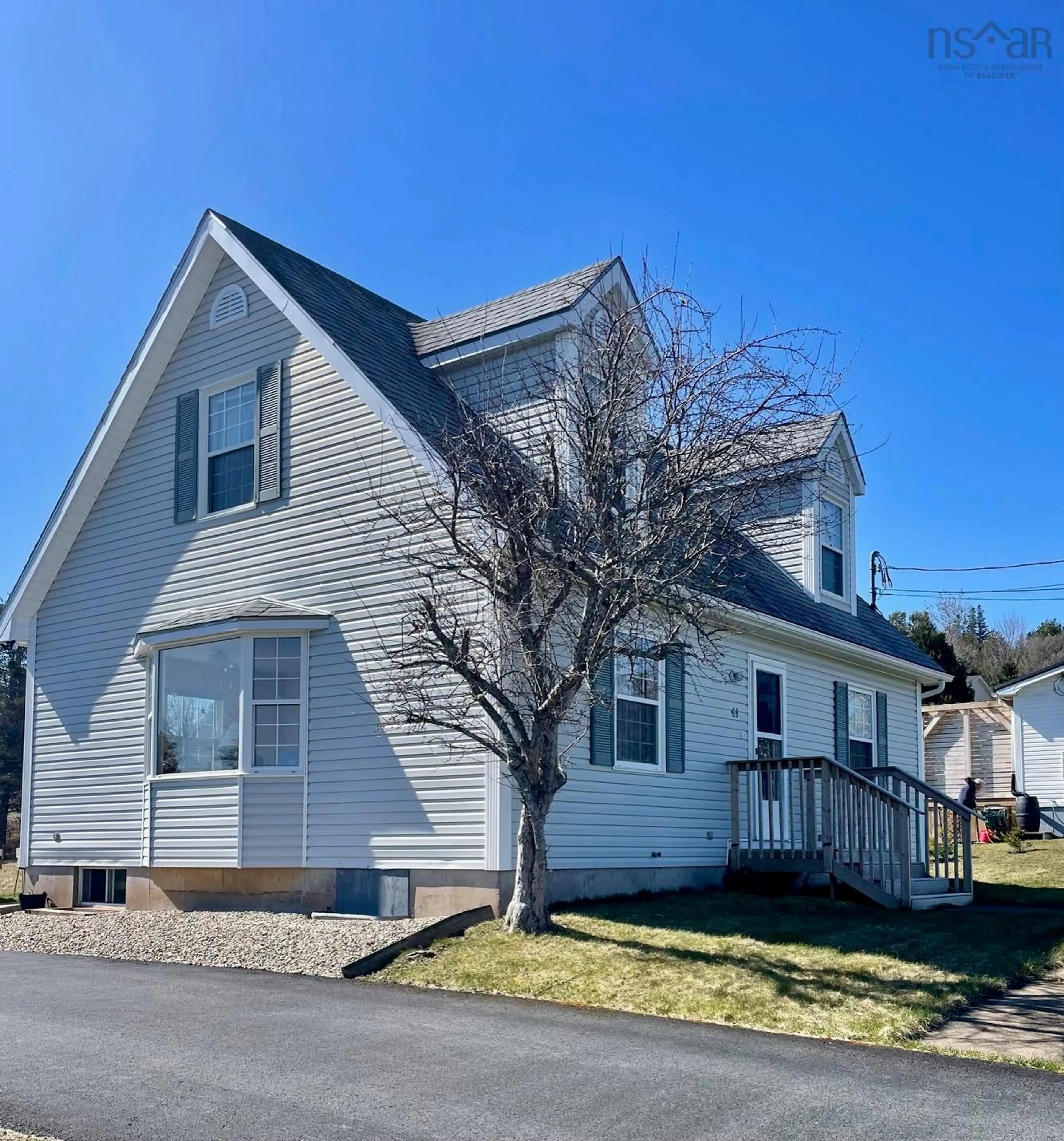 Home with vinyl exterior material, street for 63 Knickle Rd, Lunenburg Nova Scotia B0J 2C0