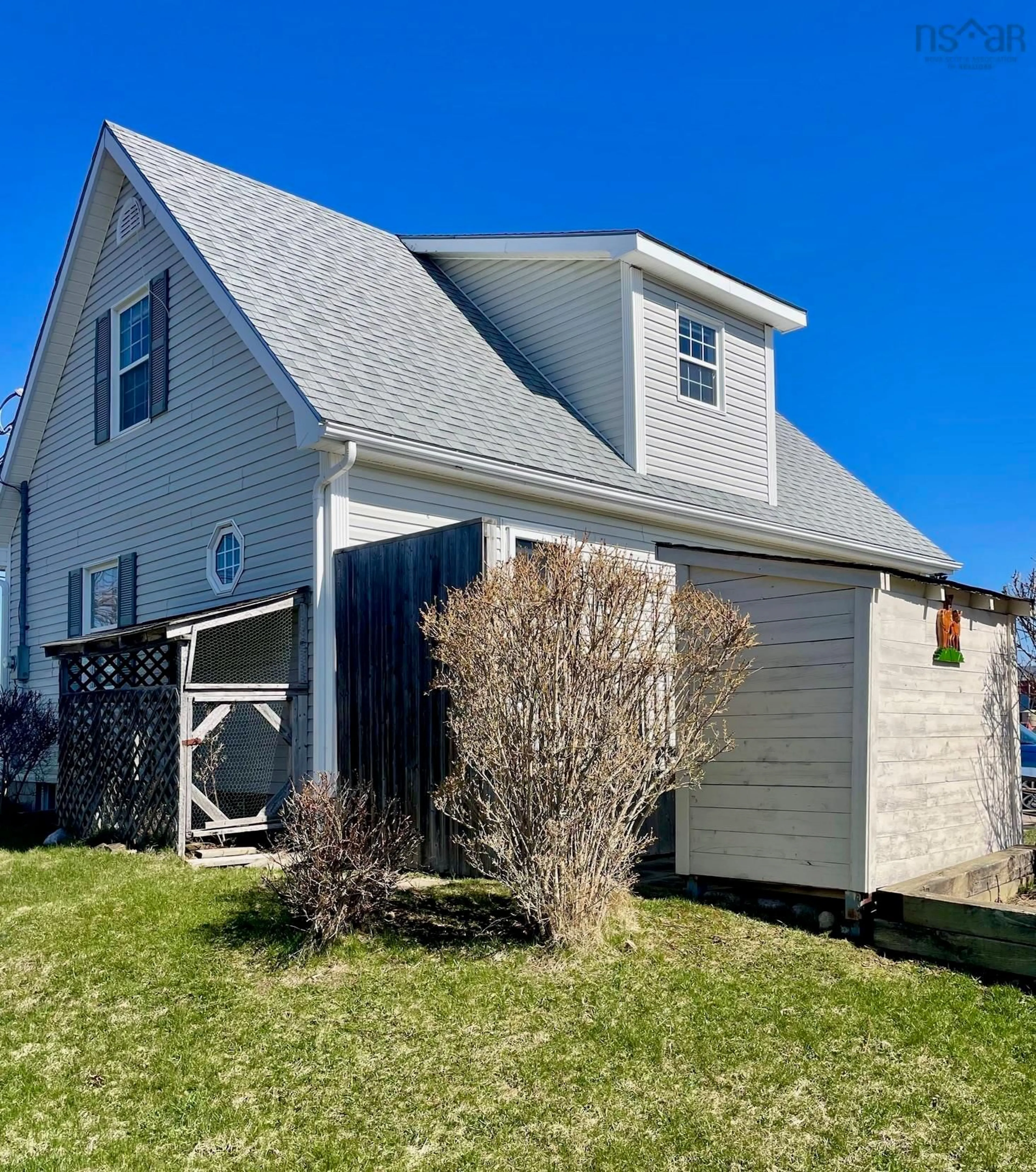 Home with vinyl exterior material, street for 63 Knickle Rd, Lunenburg Nova Scotia B0J 2C0