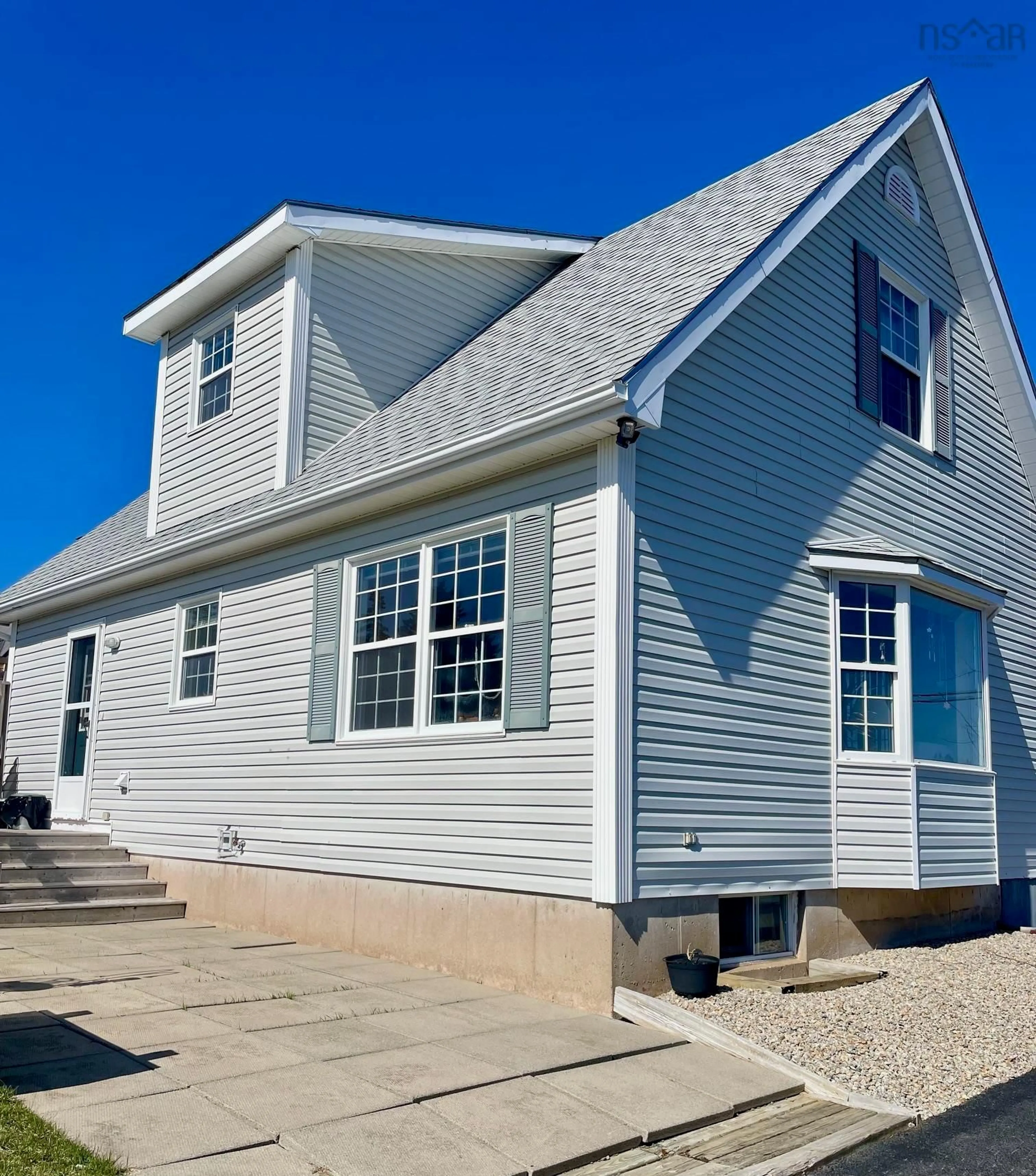 Home with vinyl exterior material, street for 63 Knickle Rd, Lunenburg Nova Scotia B0J 2C0
