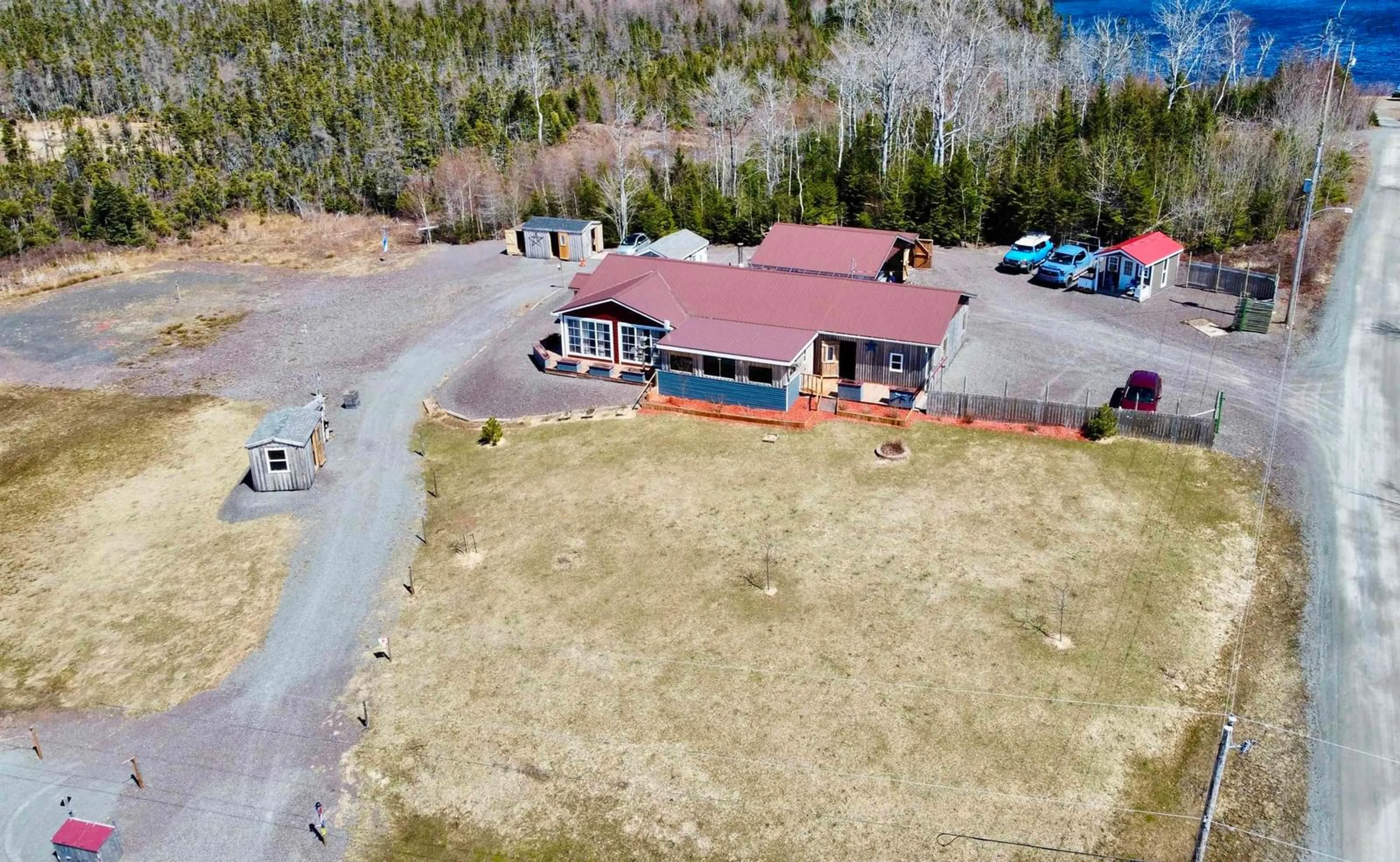 A pic from outside/outdoor area/front of a property/back of a property/a pic from drone, unknown for 7 Lances Lane, D'Escousse Nova Scotia B0E 1K0