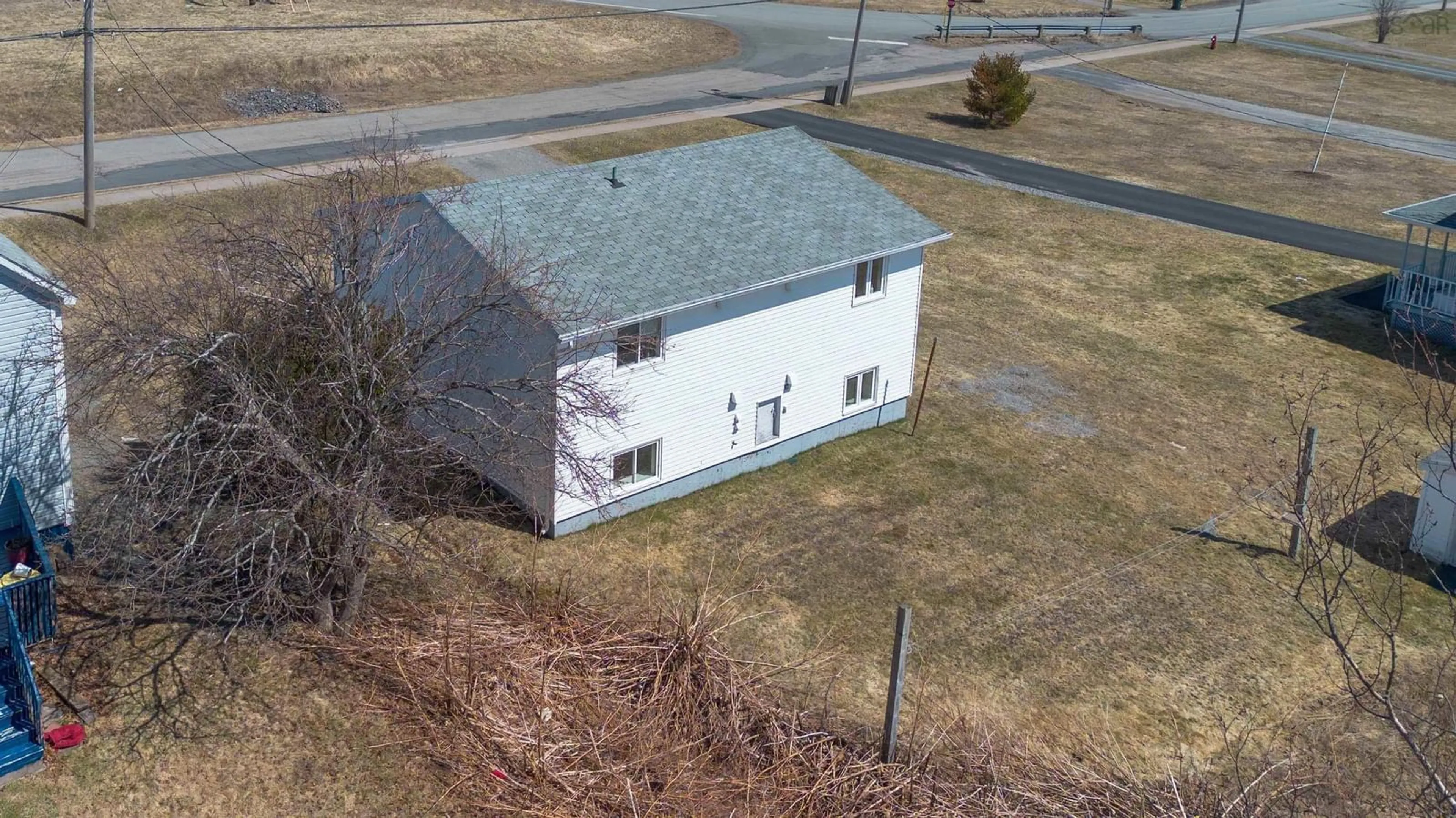 A pic from outside/outdoor area/front of a property/back of a property/a pic from drone, building for 10-12 Wilson Crt, Reserve Mines Nova Scotia B1E 1C9