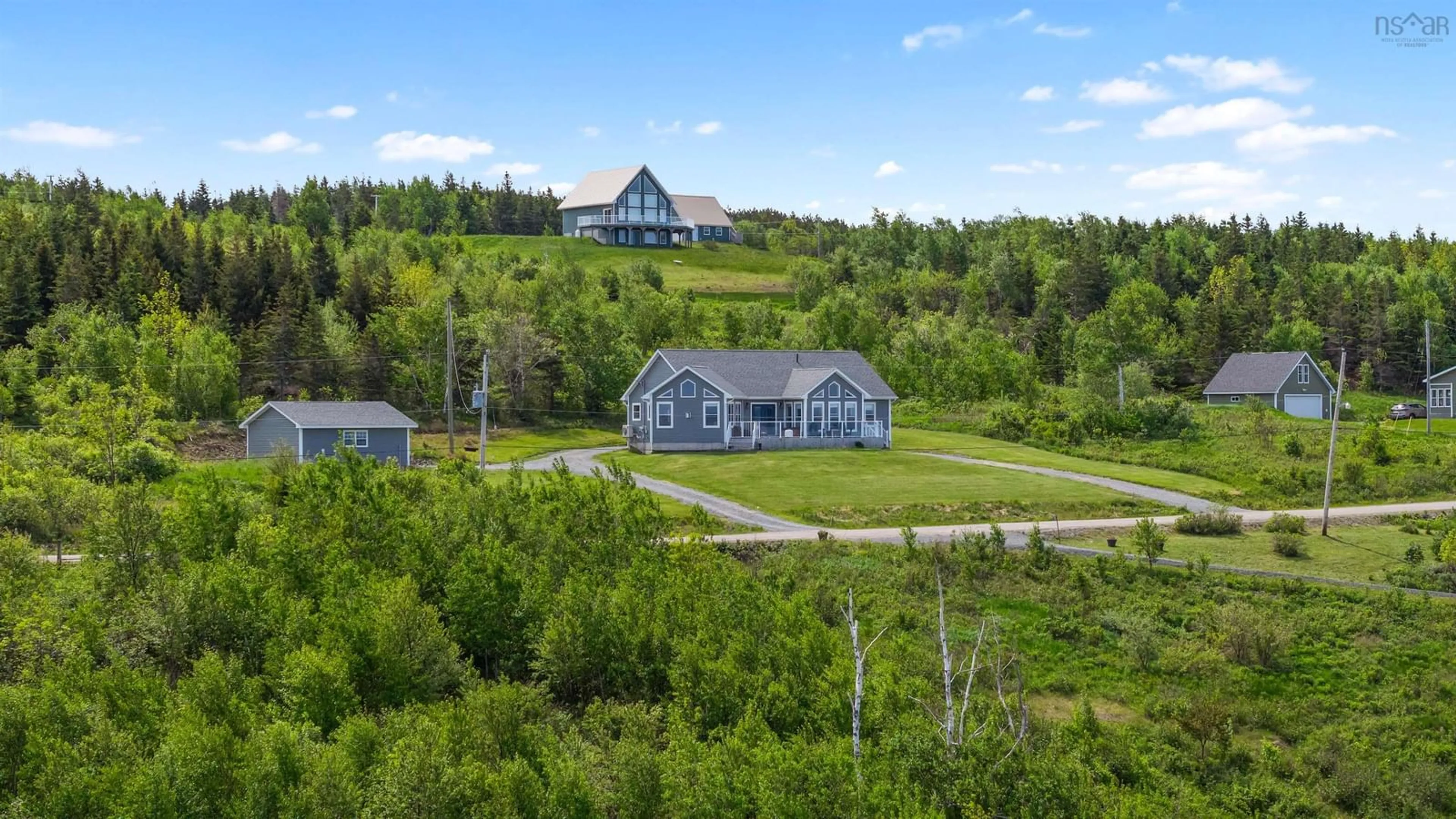 A pic from outside/outdoor area/front of a property/back of a property/a pic from drone, water/lake/river/ocean view for 34 Birchwood Ridge, Arisaig Nova Scotia B2G 2L1