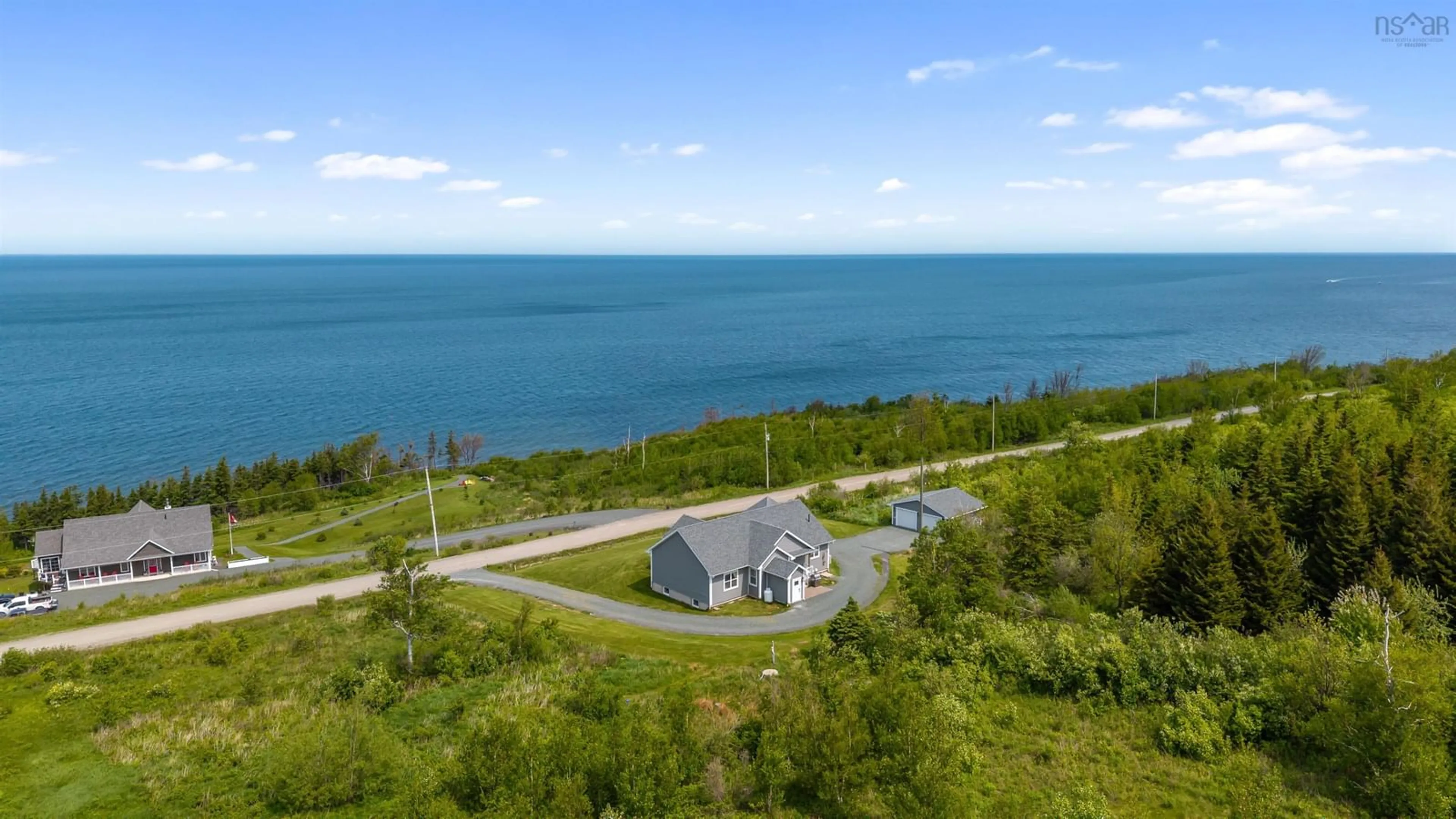 A pic from outside/outdoor area/front of a property/back of a property/a pic from drone, water/lake/river/ocean view for 34 Birchwood Ridge, Arisaig Nova Scotia B2G 2L1