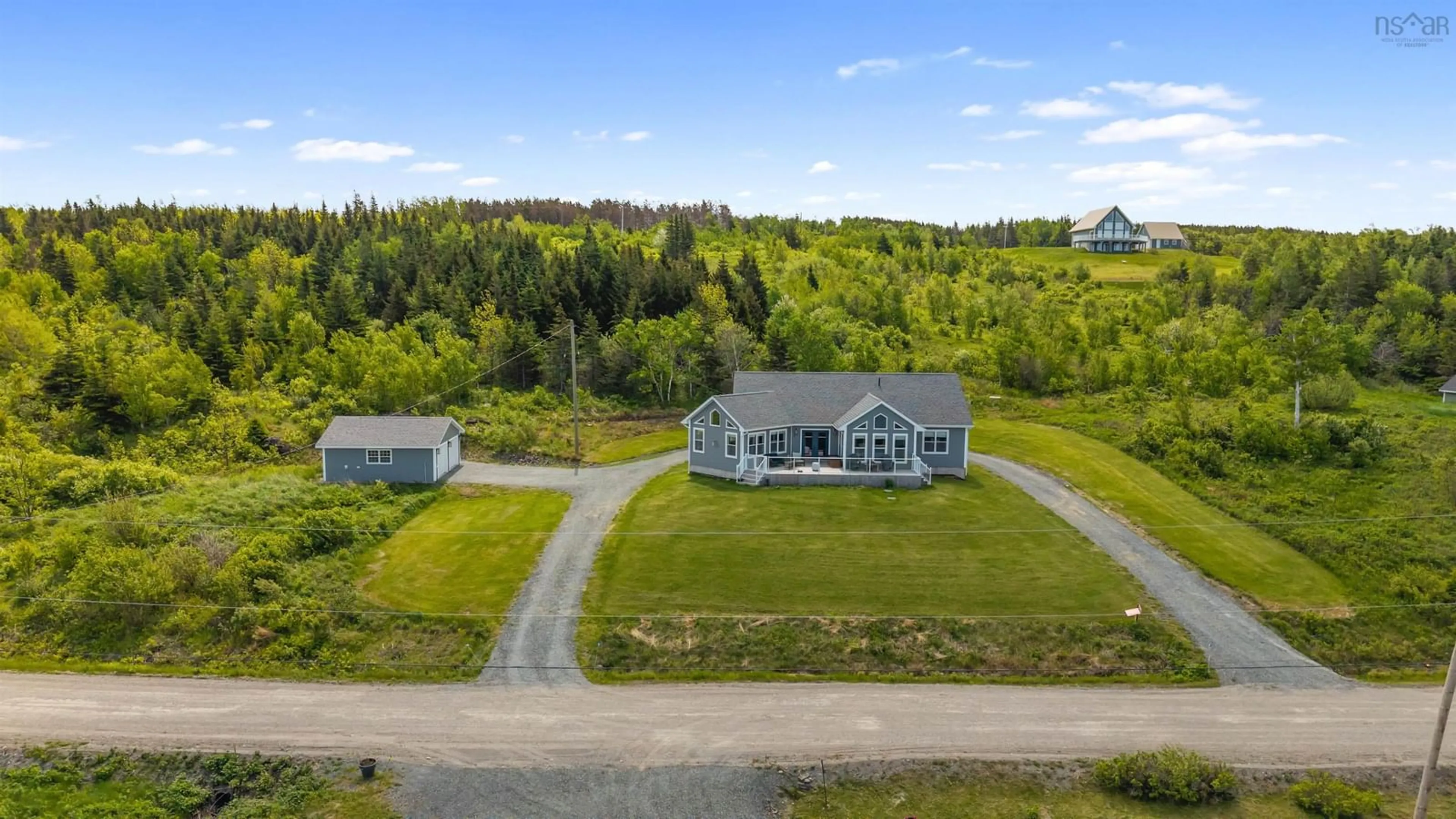 A pic from outside/outdoor area/front of a property/back of a property/a pic from drone, water/lake/river/ocean view for 34 Birchwood Ridge, Arisaig Nova Scotia B2G 2L1
