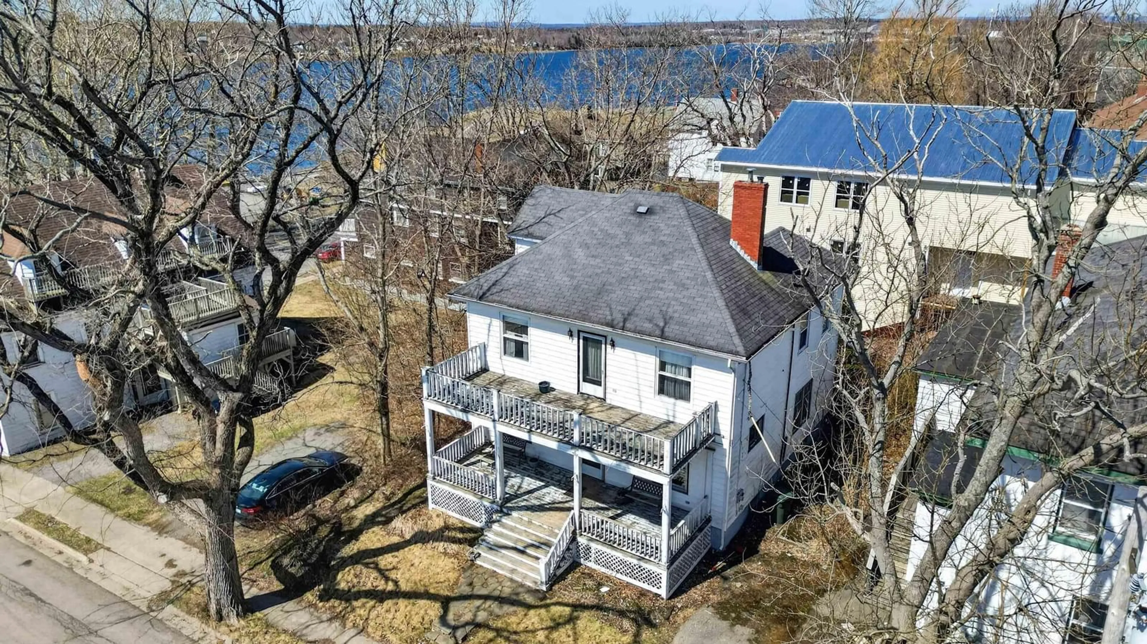 A pic from outside/outdoor area/front of a property/back of a property/a pic from drone, water/lake/river/ocean view for 15 Amelia St, Sydney Nova Scotia B1P 6C1