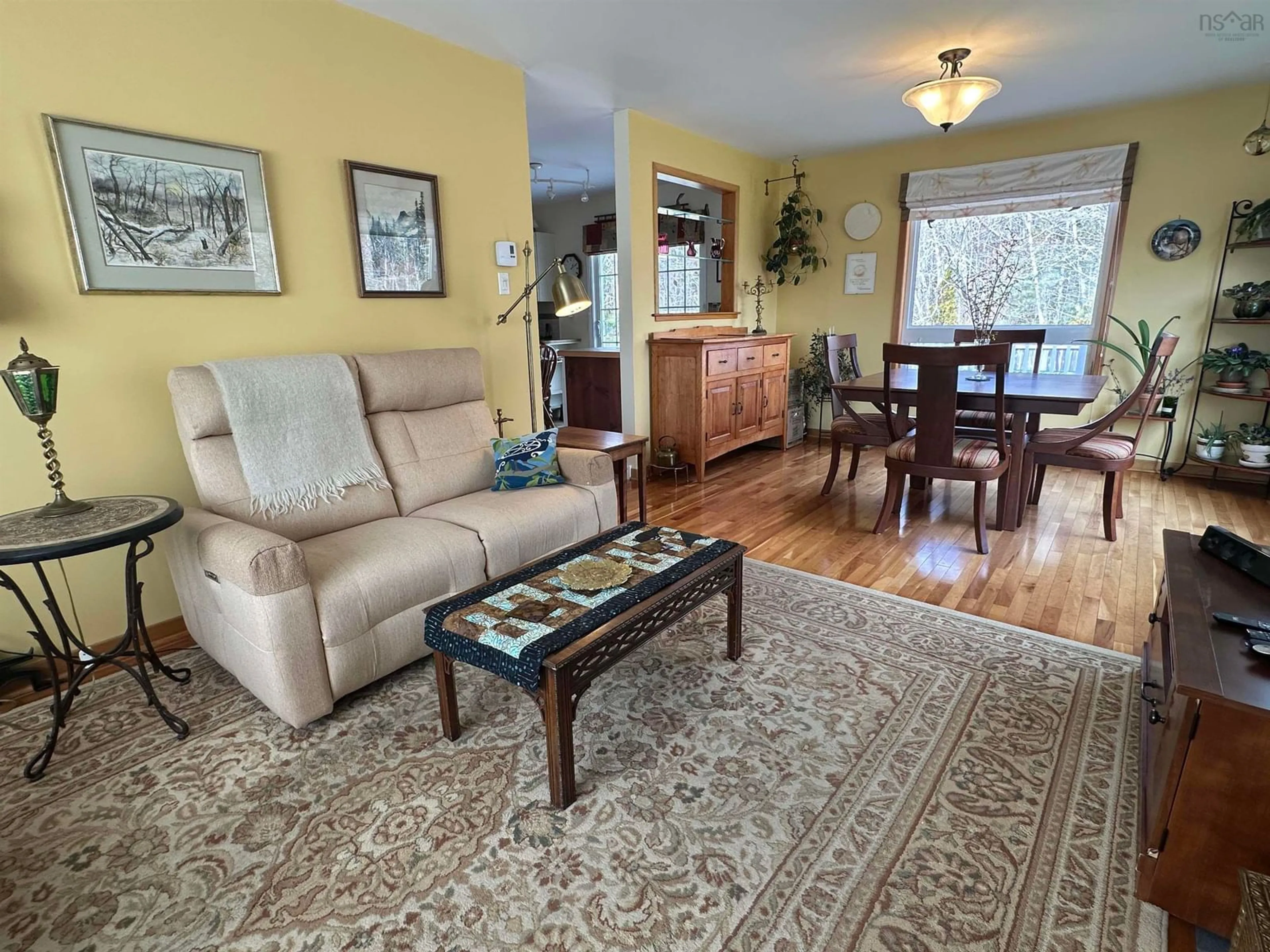 Living room with furniture, wood/laminate floor for 46 Old Falls Rd, Liverpool Nova Scotia B0T 1K0