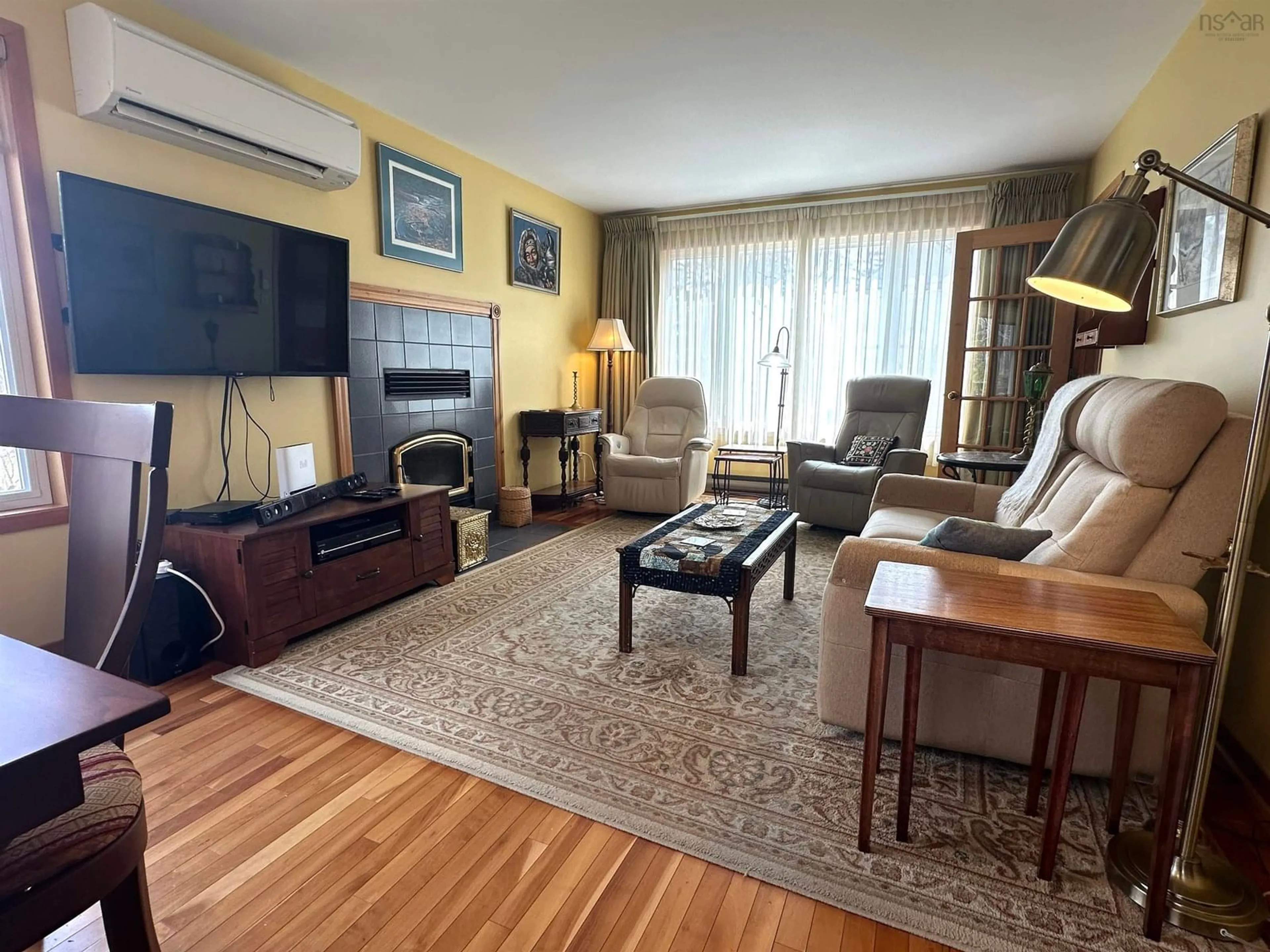 Living room with furniture, wood/laminate floor for 46 Old Falls Rd, Liverpool Nova Scotia B0T 1K0