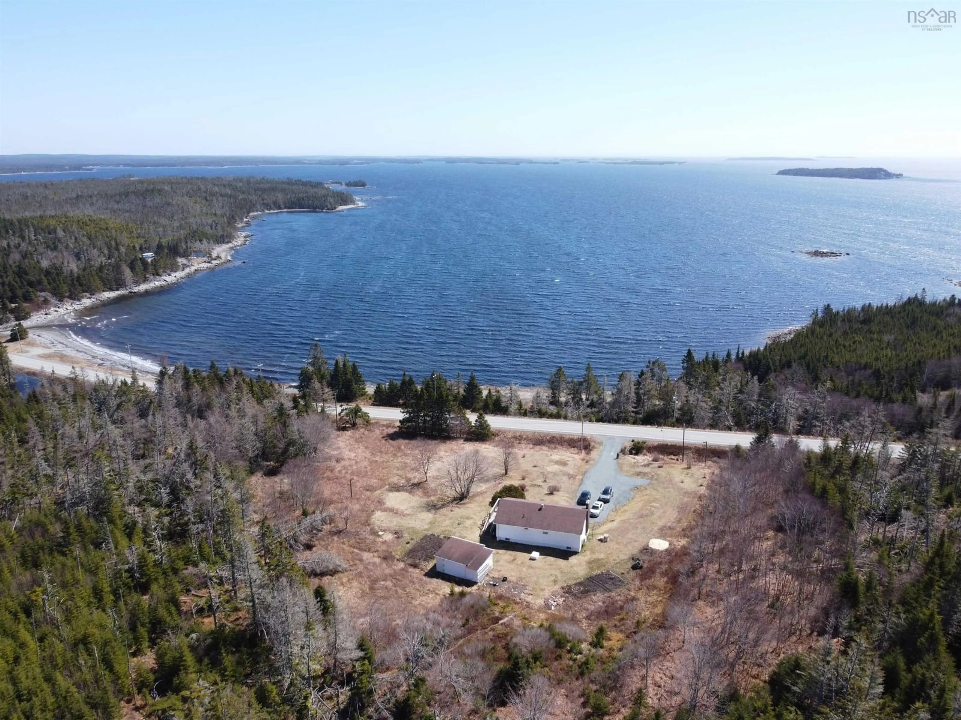 A pic from outside/outdoor area/front of a property/back of a property/a pic from drone, water/lake/river/ocean view for 28019 Highway 7, Moosehead Nova Scotia B0J 2K0