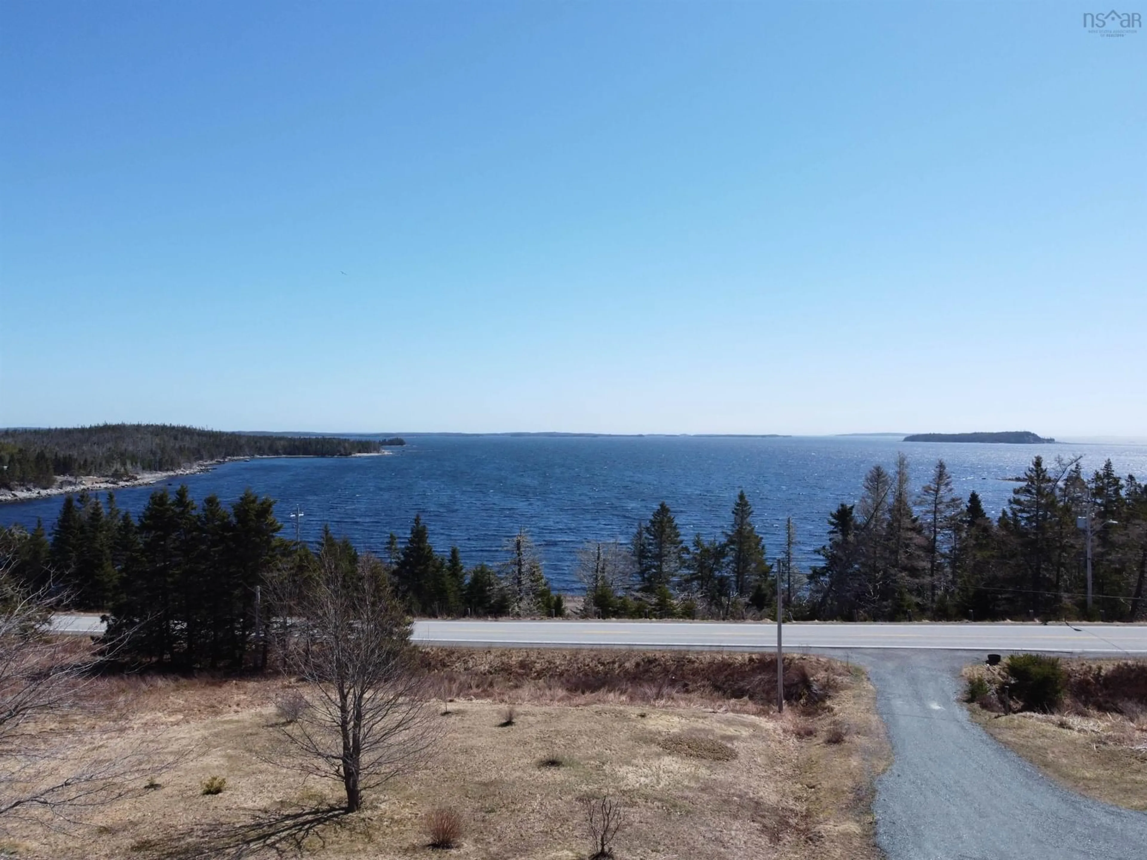 A pic from outside/outdoor area/front of a property/back of a property/a pic from drone, water/lake/river/ocean view for 28019 Highway 7, Moosehead Nova Scotia B0J 2K0