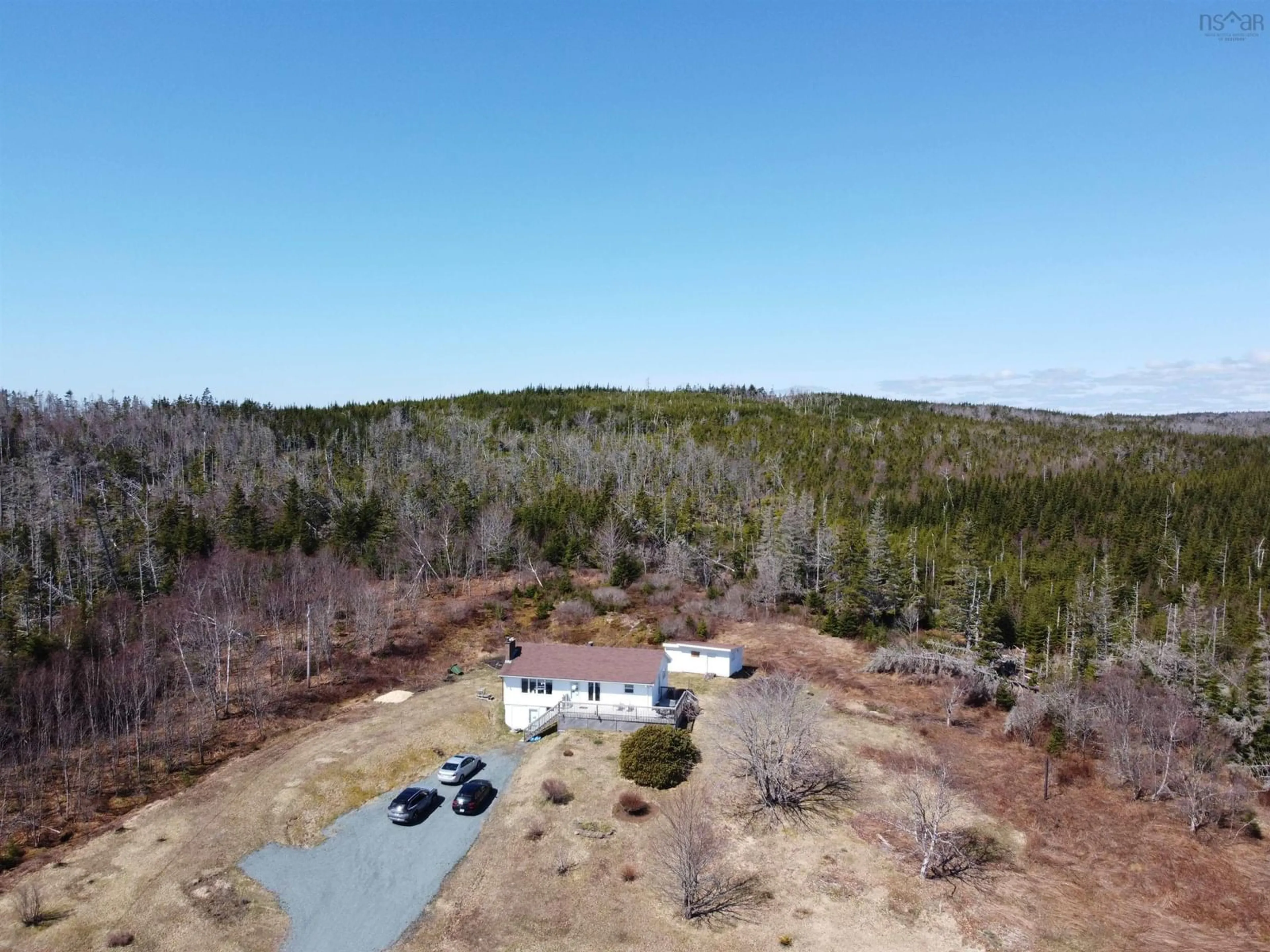 A pic from outside/outdoor area/front of a property/back of a property/a pic from drone, forest/trees view for 28019 Highway 7, Moosehead Nova Scotia B0J 2K0