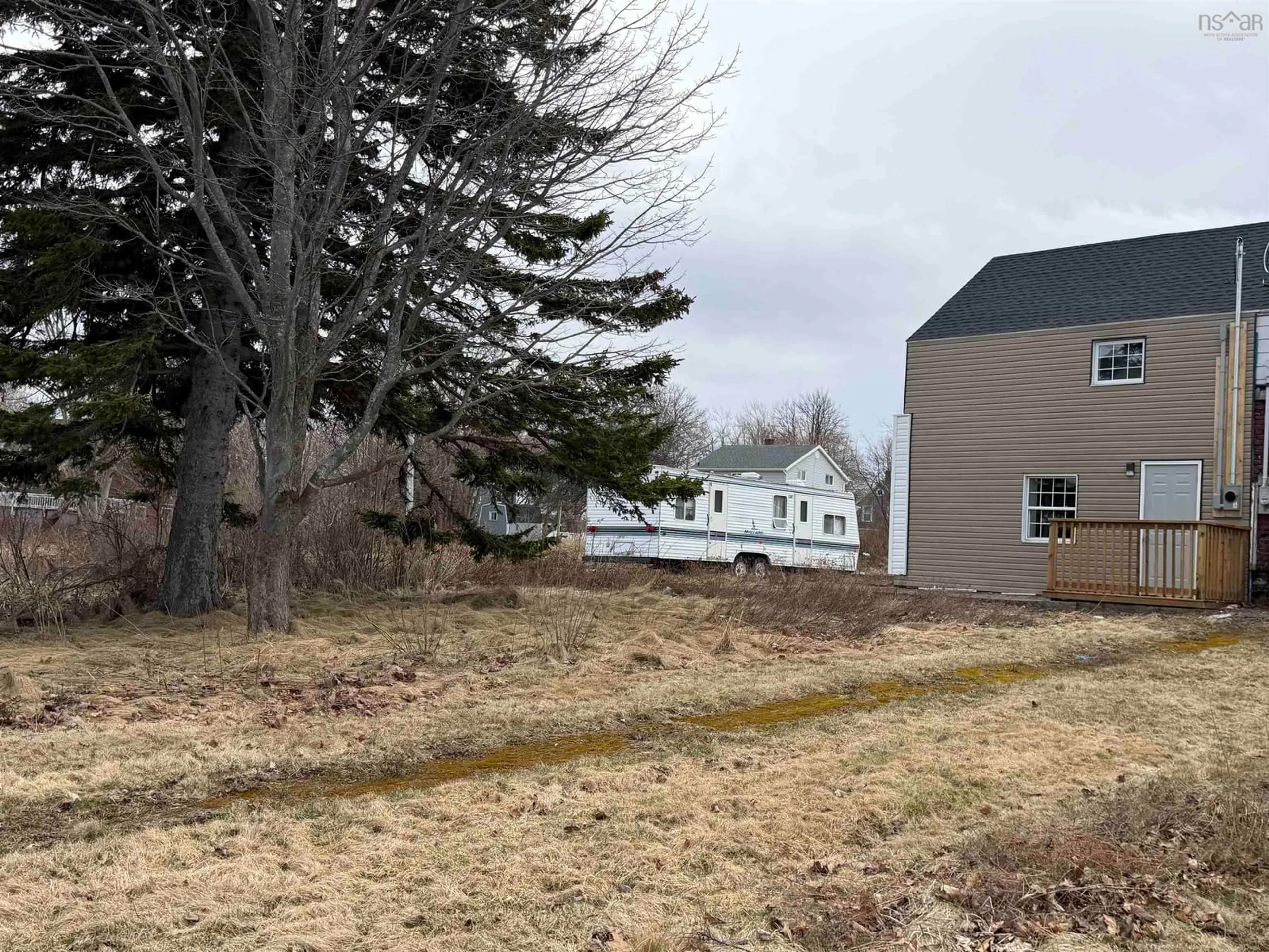A pic from outside/outdoor area/front of a property/back of a property/a pic from drone, street for 587 Main St, Sydney Mines Nova Scotia B1V 2K9