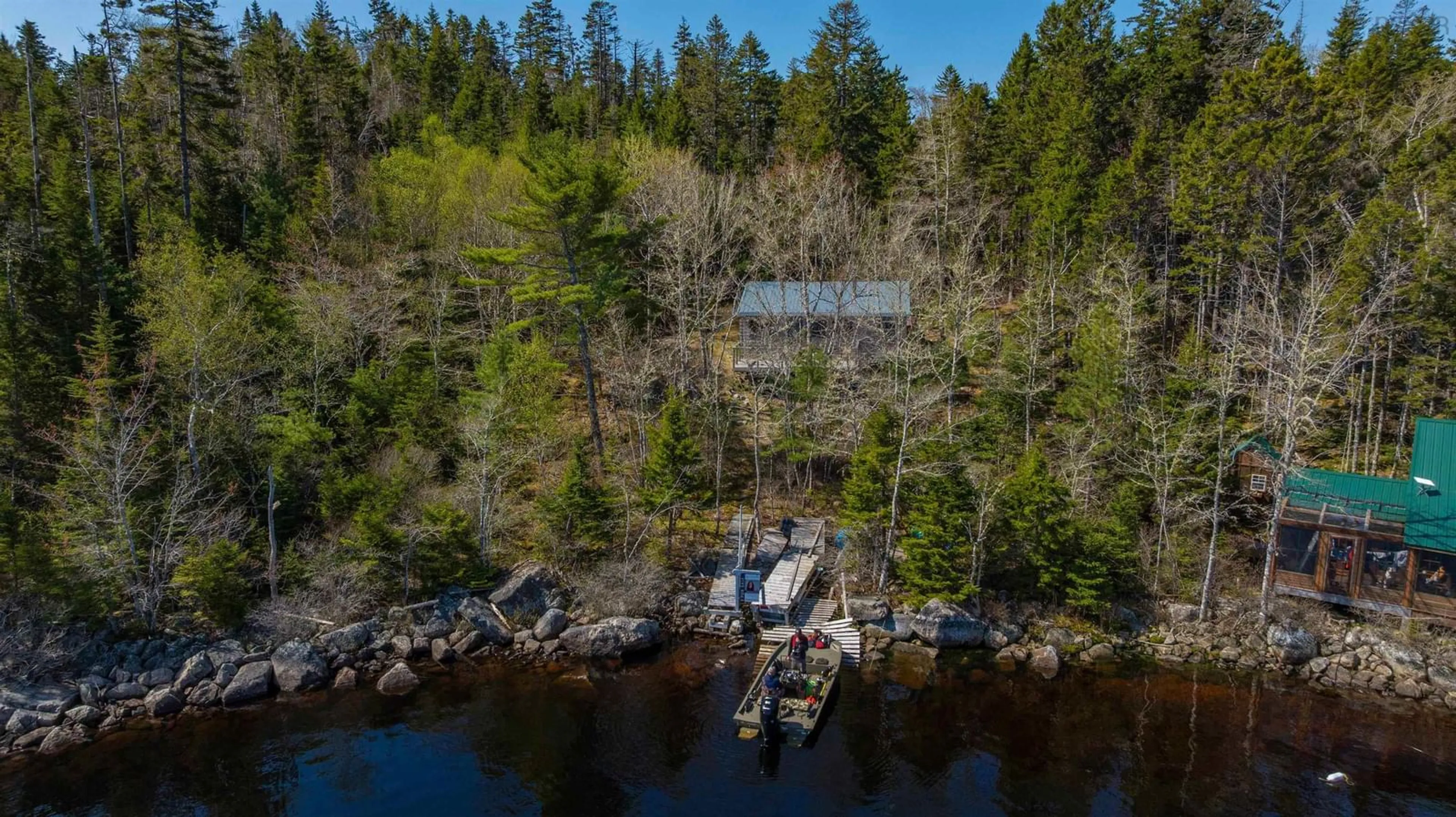 A pic from outside/outdoor area/front of a property/back of a property/a pic from drone, water/lake/river/ocean view for 972 Lake Charlotte Water Access, Lake Charlotte Nova Scotia B0J 1P0