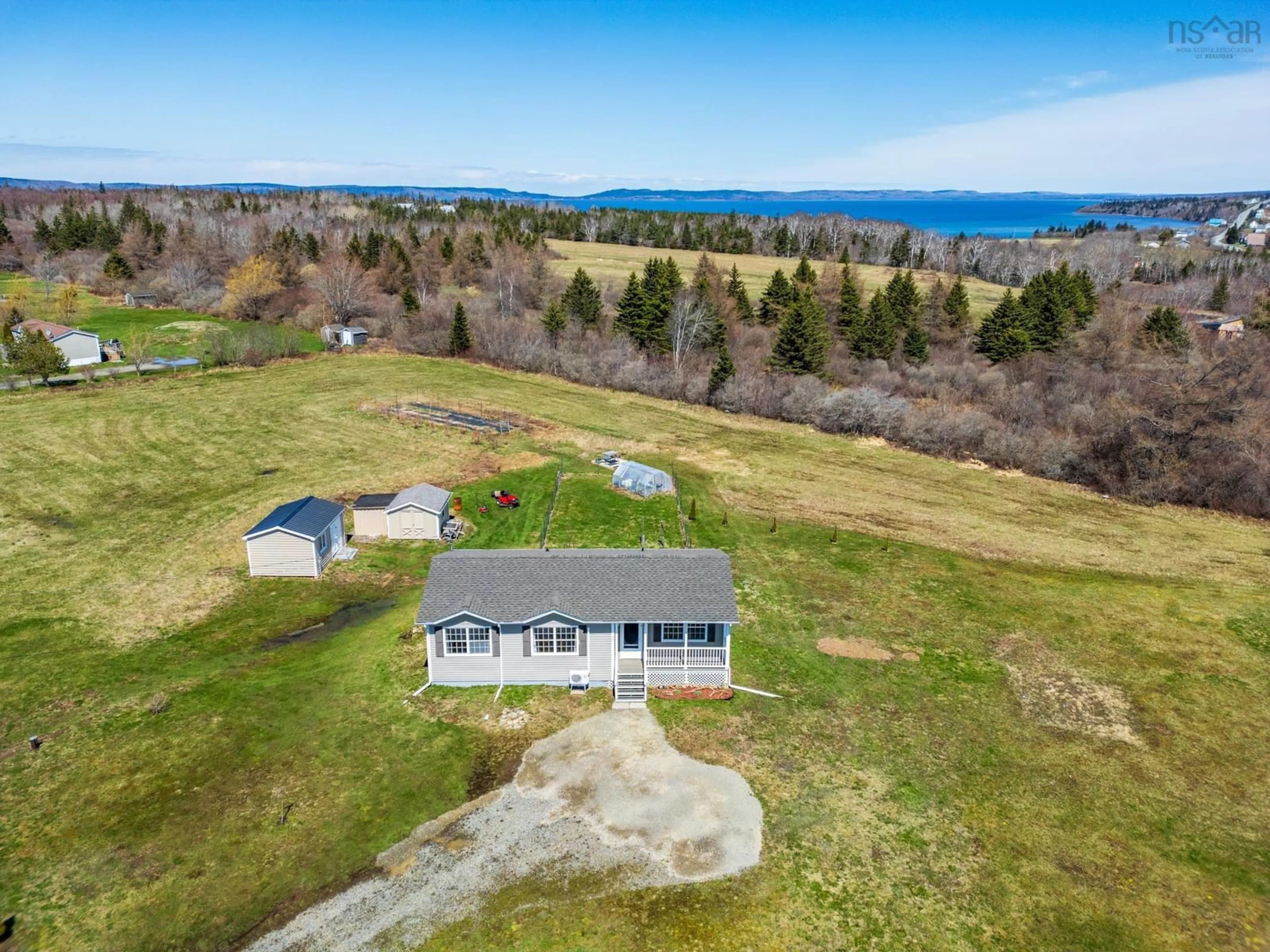 A pic from outside/outdoor area/front of a property/back of a property/a pic from drone, water/lake/river/ocean view for 30 Kinney Road, Ashmore Nova Scotia B0W 3T0