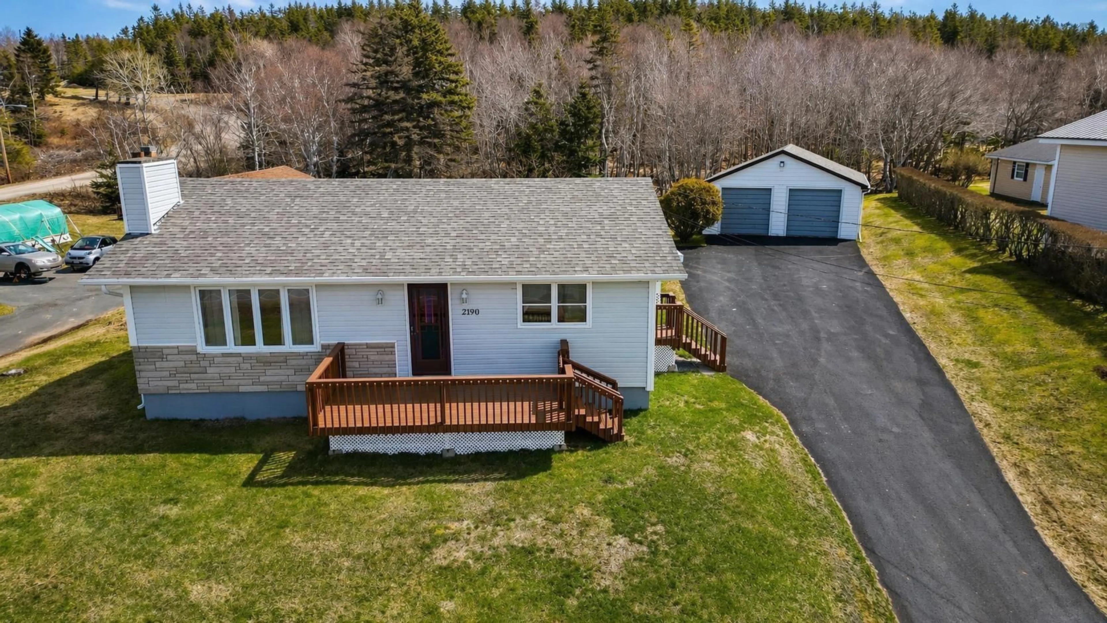 A pic from outside/outdoor area/front of a property/back of a property/a pic from drone, street for 2190 Highway 28, South Bar Nova Scotia B1N 3H7