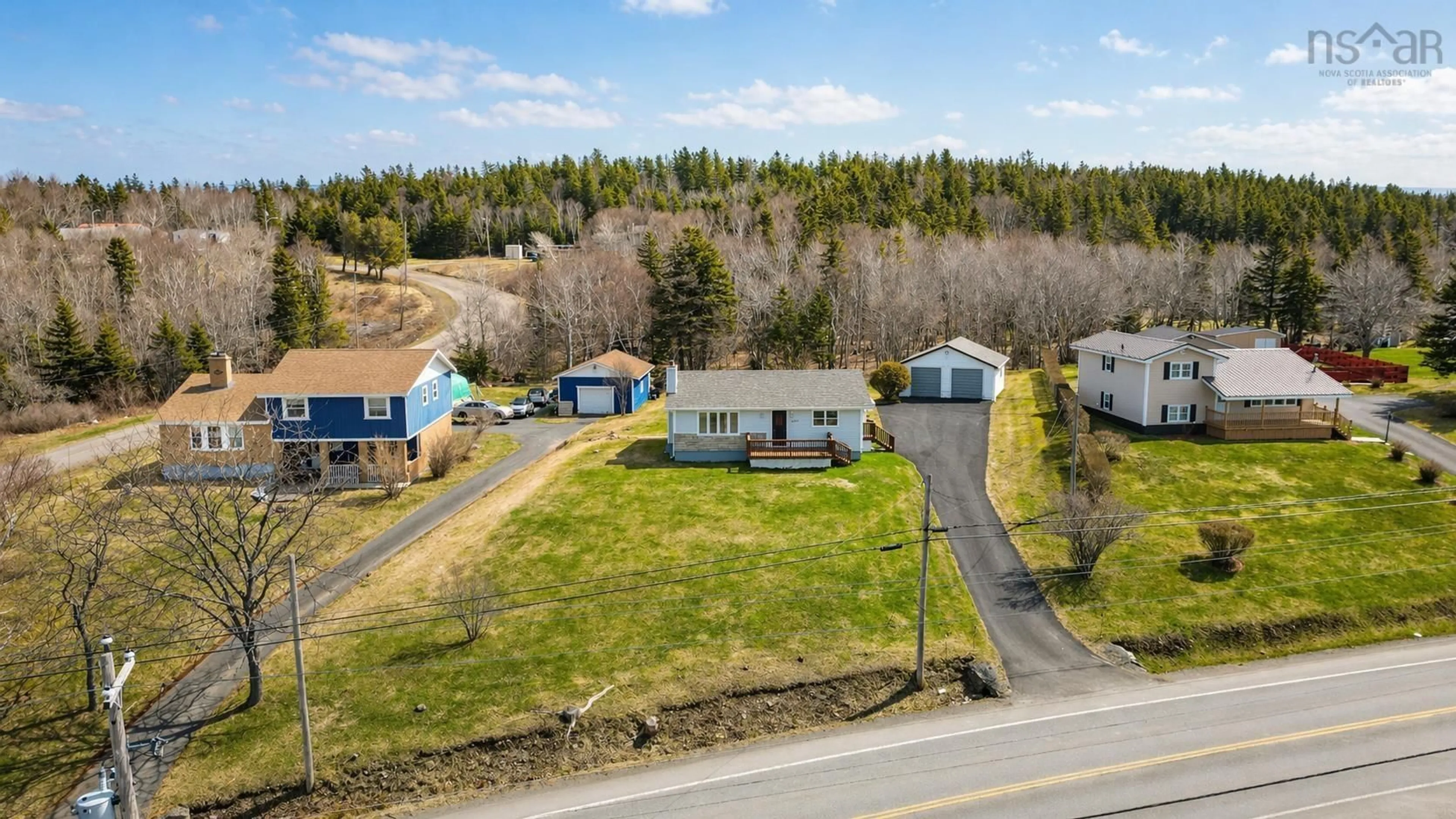 A pic from outside/outdoor area/front of a property/back of a property/a pic from drone, street for 2190 Highway 28, South Bar Nova Scotia B1N 3H7