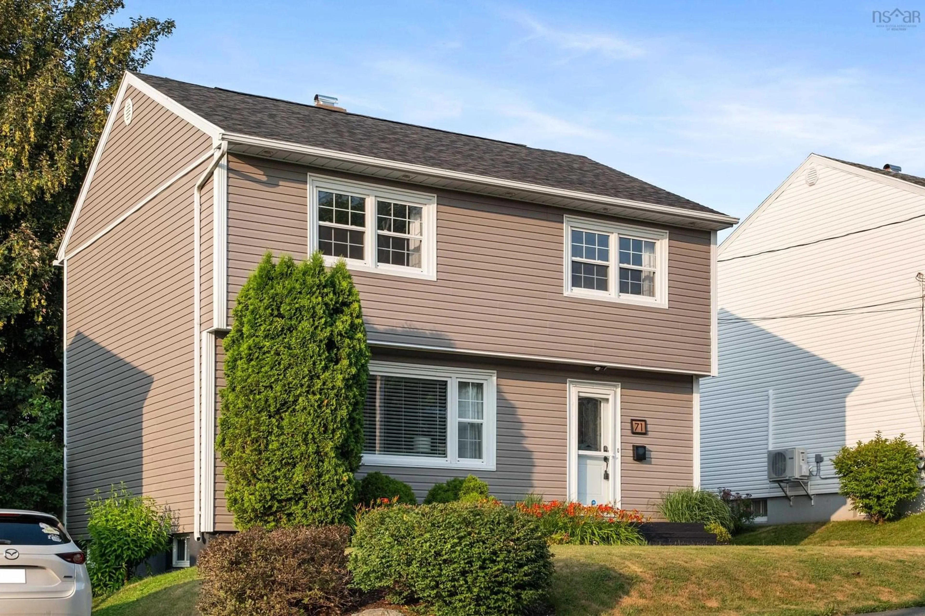 Home with vinyl exterior material, street for 71 Moxham Dr, Sydney Nova Scotia B1S 1Z9