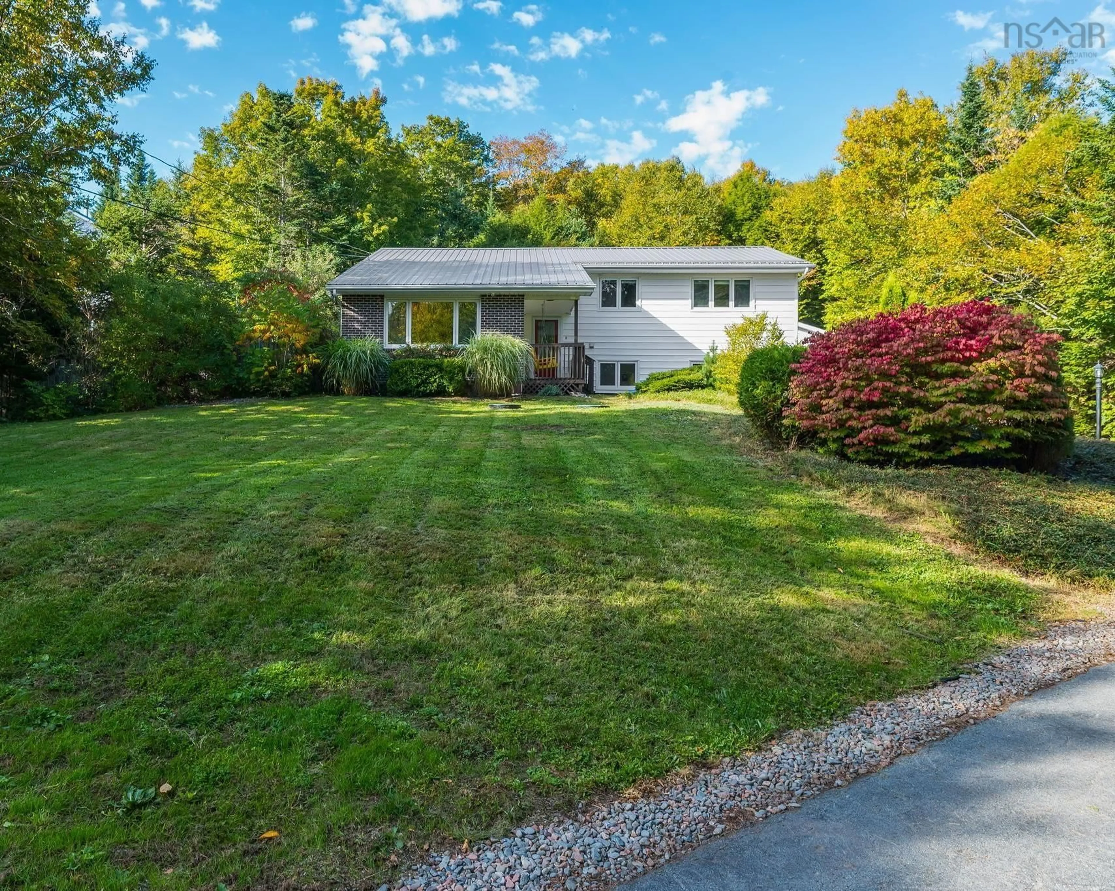 Home with vinyl exterior material, street for 65 Marie Ave, Lake Echo Nova Scotia B3E 1A9