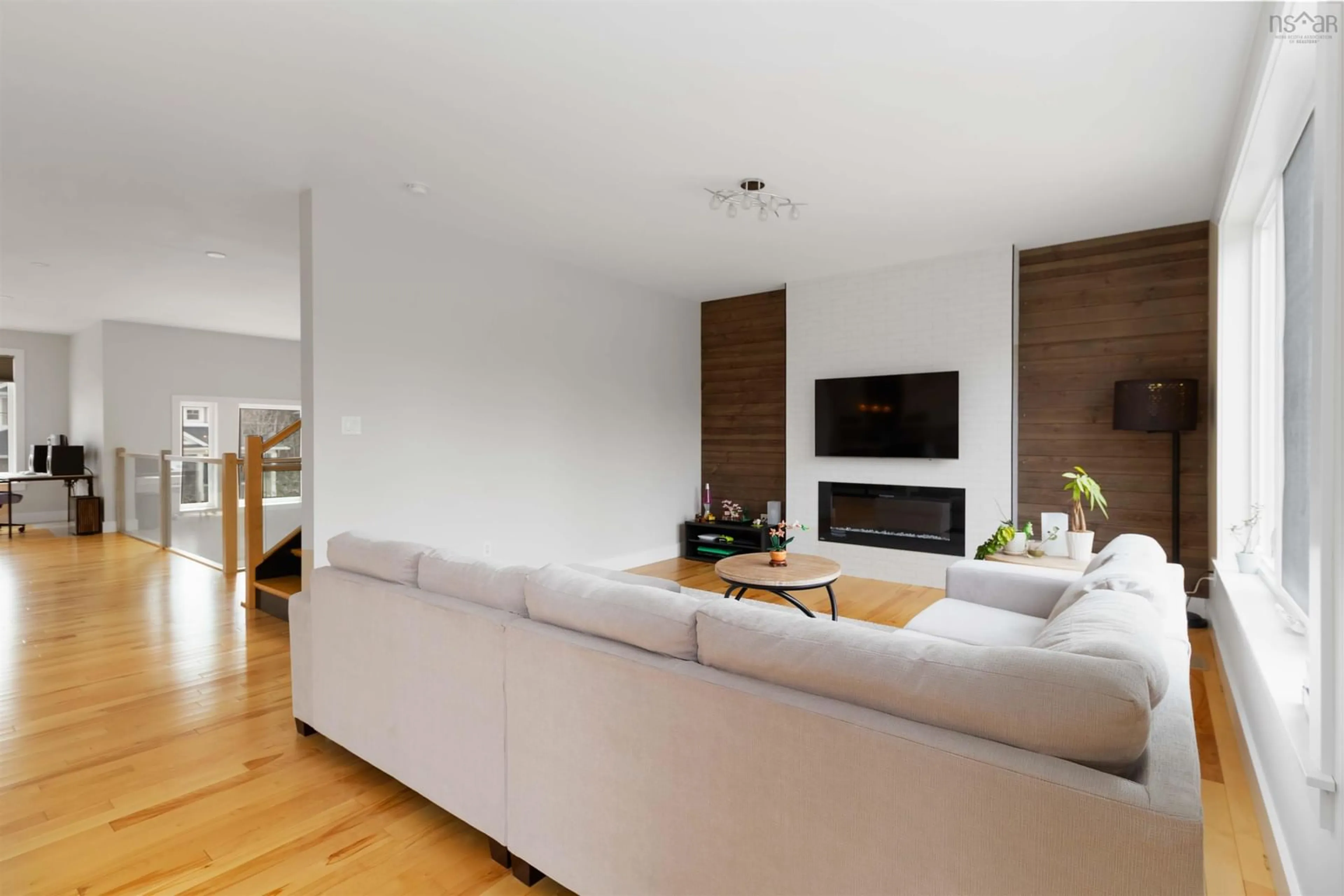 Living room with furniture, wood/laminate floor for 385 Starboard Dr, Halifax Nova Scotia B3M 4W5