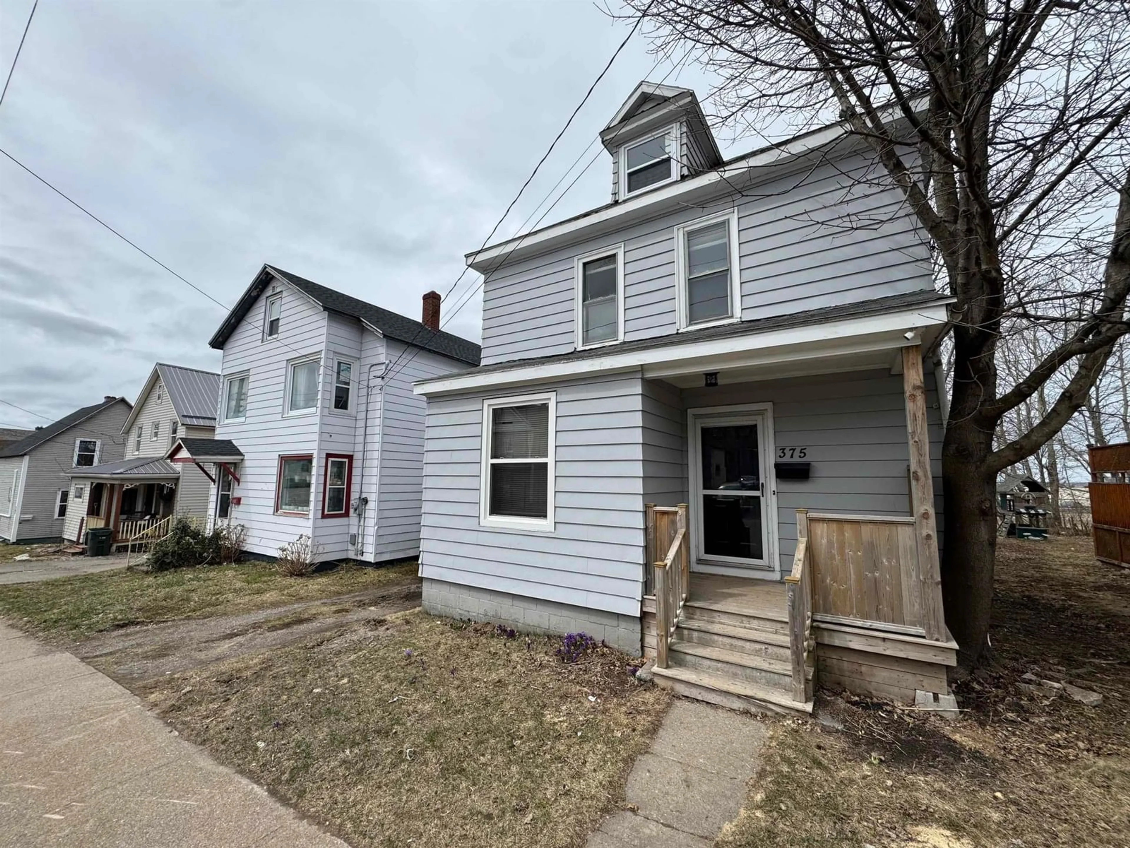 Home with vinyl exterior material, street for 375 Townsend St, Sydney Nova Scotia B1P 5G3