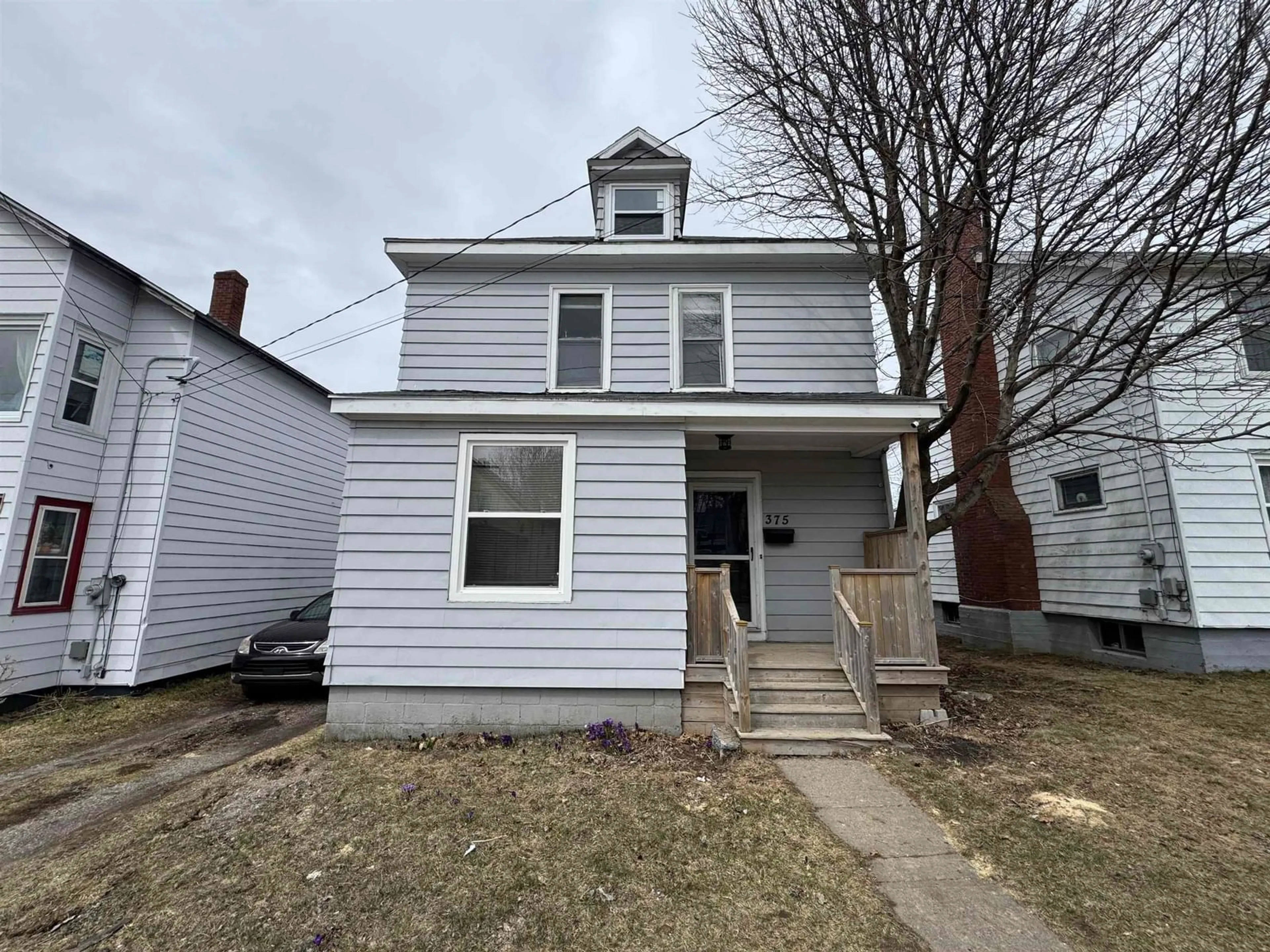 Home with vinyl exterior material, street for 375 Townsend St, Sydney Nova Scotia B1P 5G3