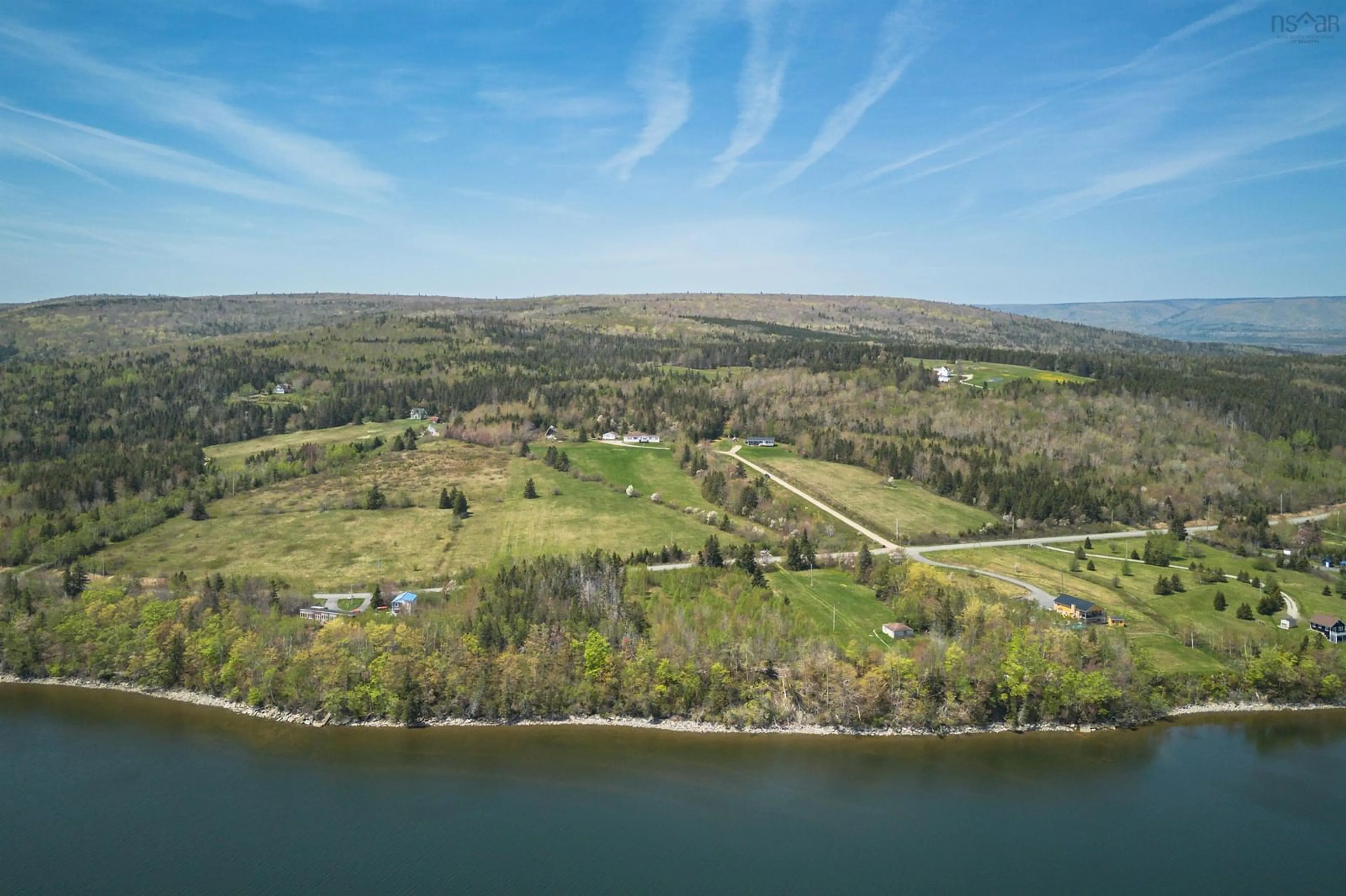 A pic from outside/outdoor area/front of a property/back of a property/a pic from drone, water/lake/river/ocean view for 1576 West Lake Ainslie Rd, West Lake Ainslie Nova Scotia B0E 1N0