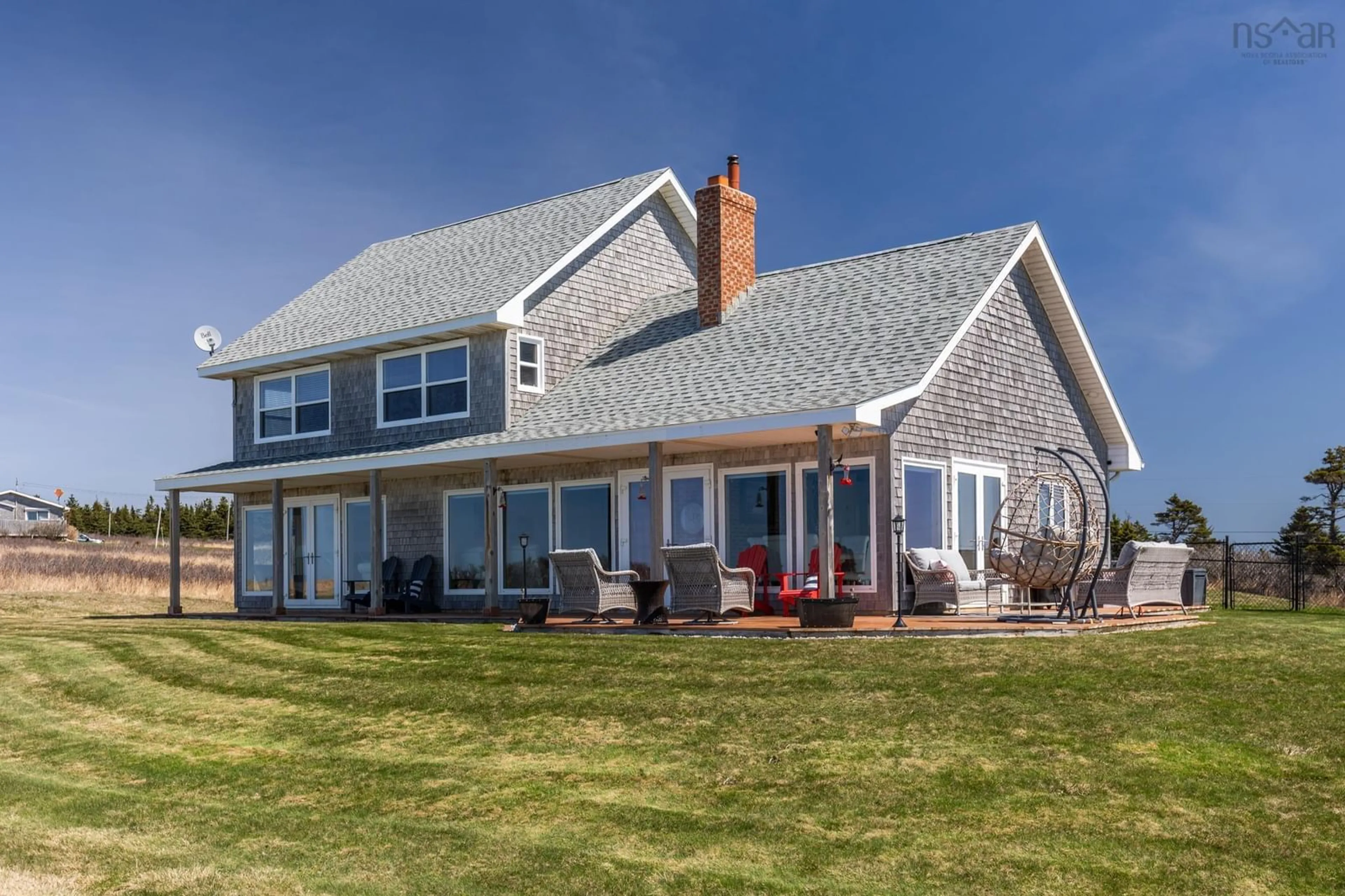Home with vinyl exterior material, water/lake/river/ocean view for 2435 Main Shore Rd, Port Maitland Nova Scotia B5A 5V1