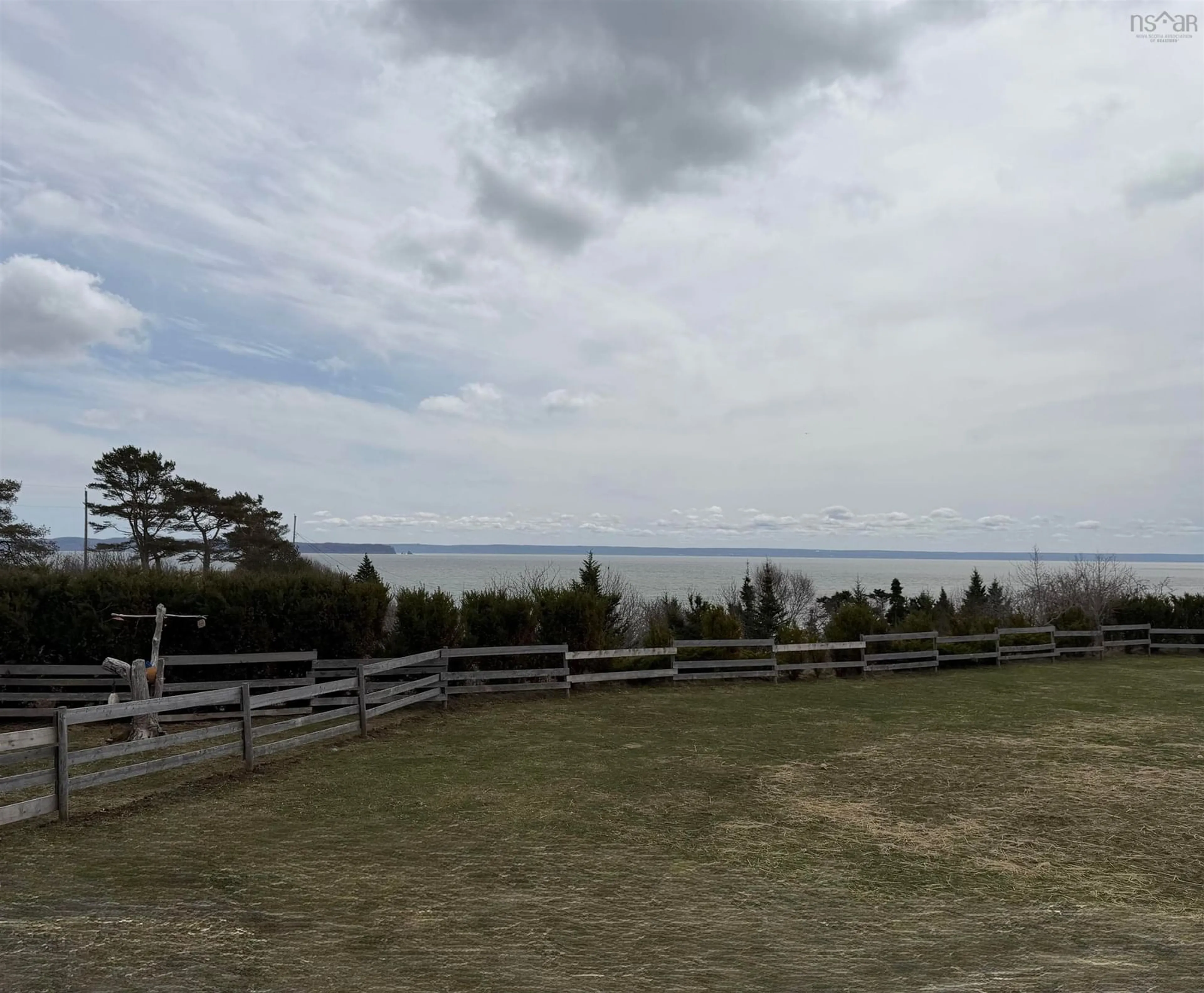 A pic from outside/outdoor area/front of a property/back of a property/a pic from drone, water/lake/river/ocean view for 8622 Highway 209 #209, Port Greville Nova Scotia B0M 1S0