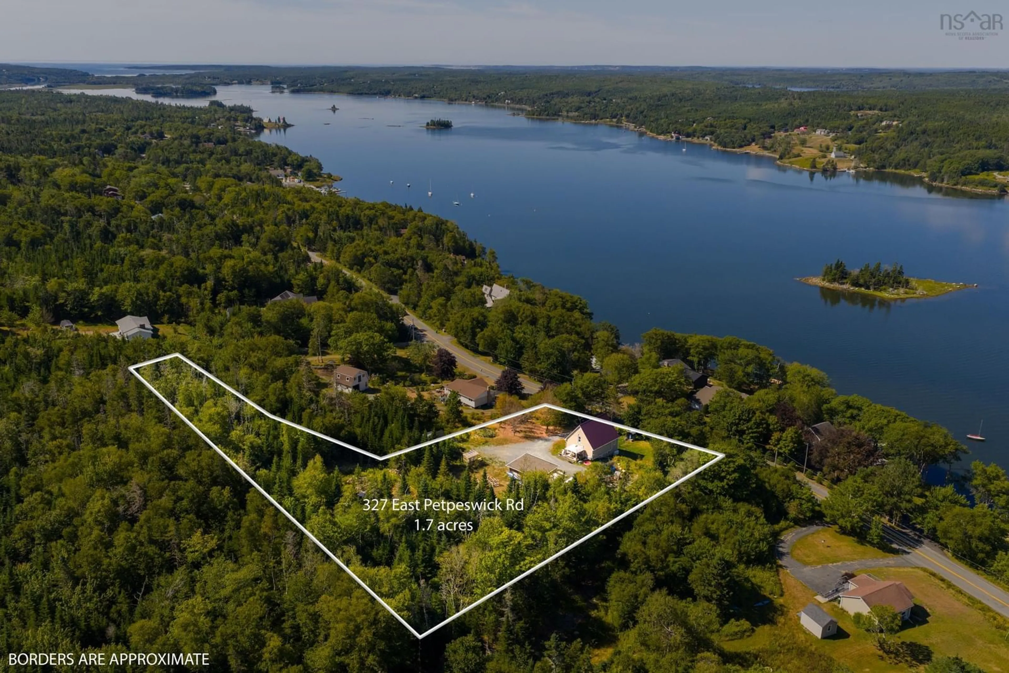 A pic from outside/outdoor area/front of a property/back of a property/a pic from drone, water/lake/river/ocean view for 327 East Petpeswick Rd, East Petpeswick Nova Scotia B0J 2L0