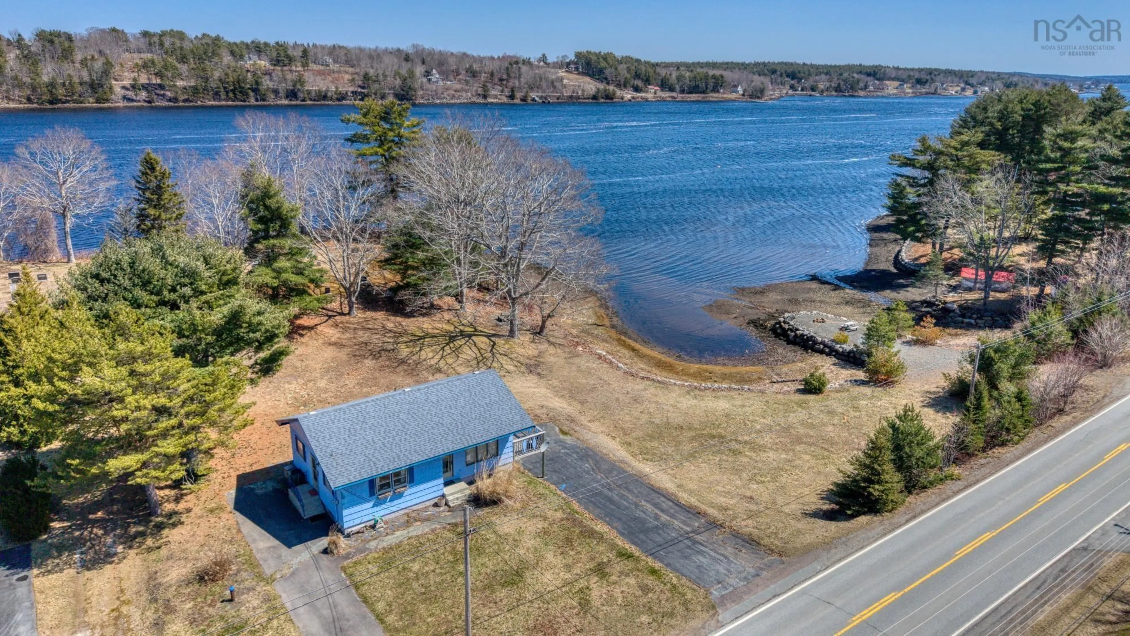 A pic from outside/outdoor area/front of a property/back of a property/a pic from drone, water/lake/river/ocean view for 1915 Highway 331, Pleasantville Nova Scotia B0R 1G0