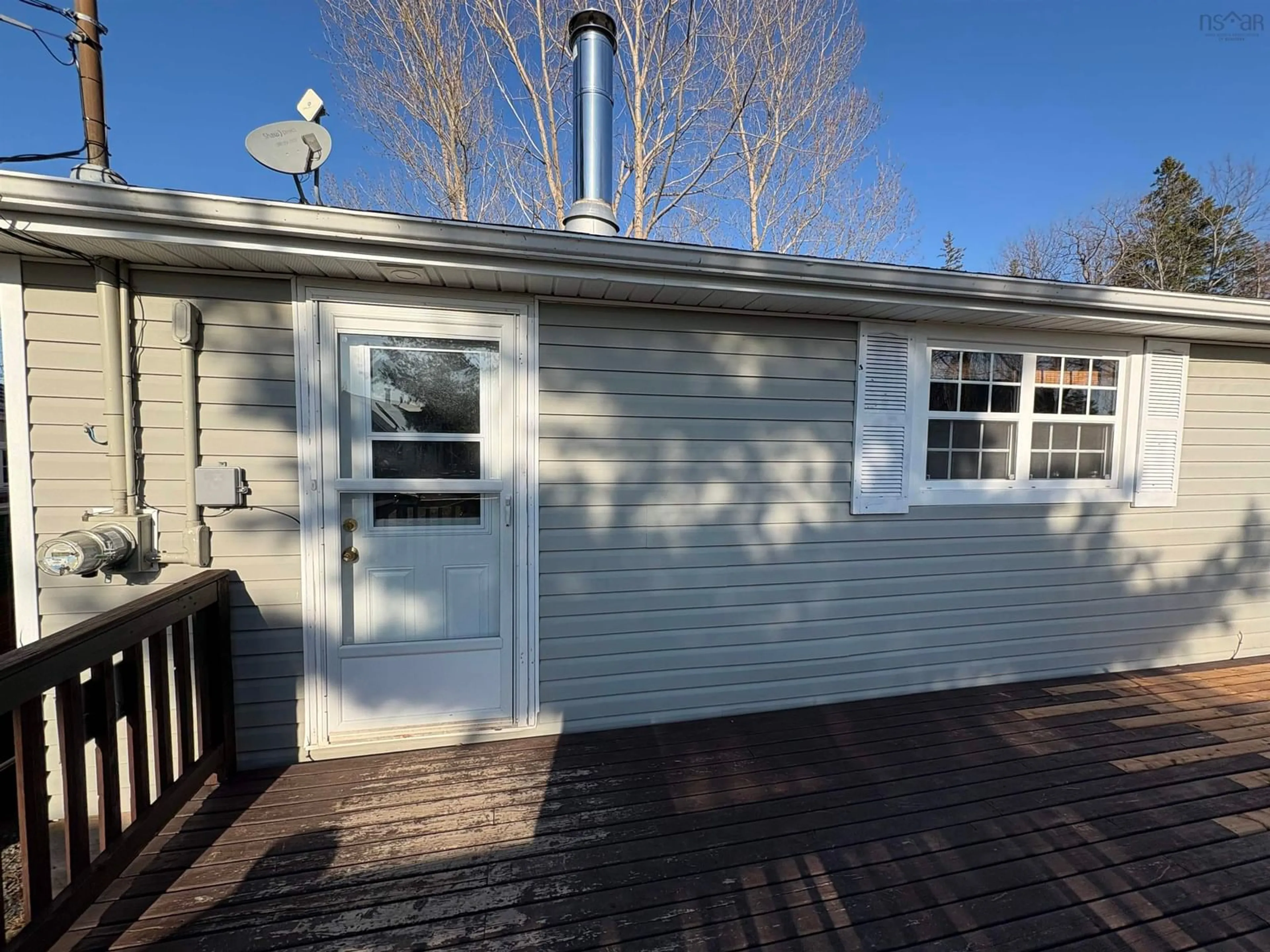 Home with vinyl exterior material, street for 200 Lighthouse Lane, Wallace Nova Scotia B0K 1Y0