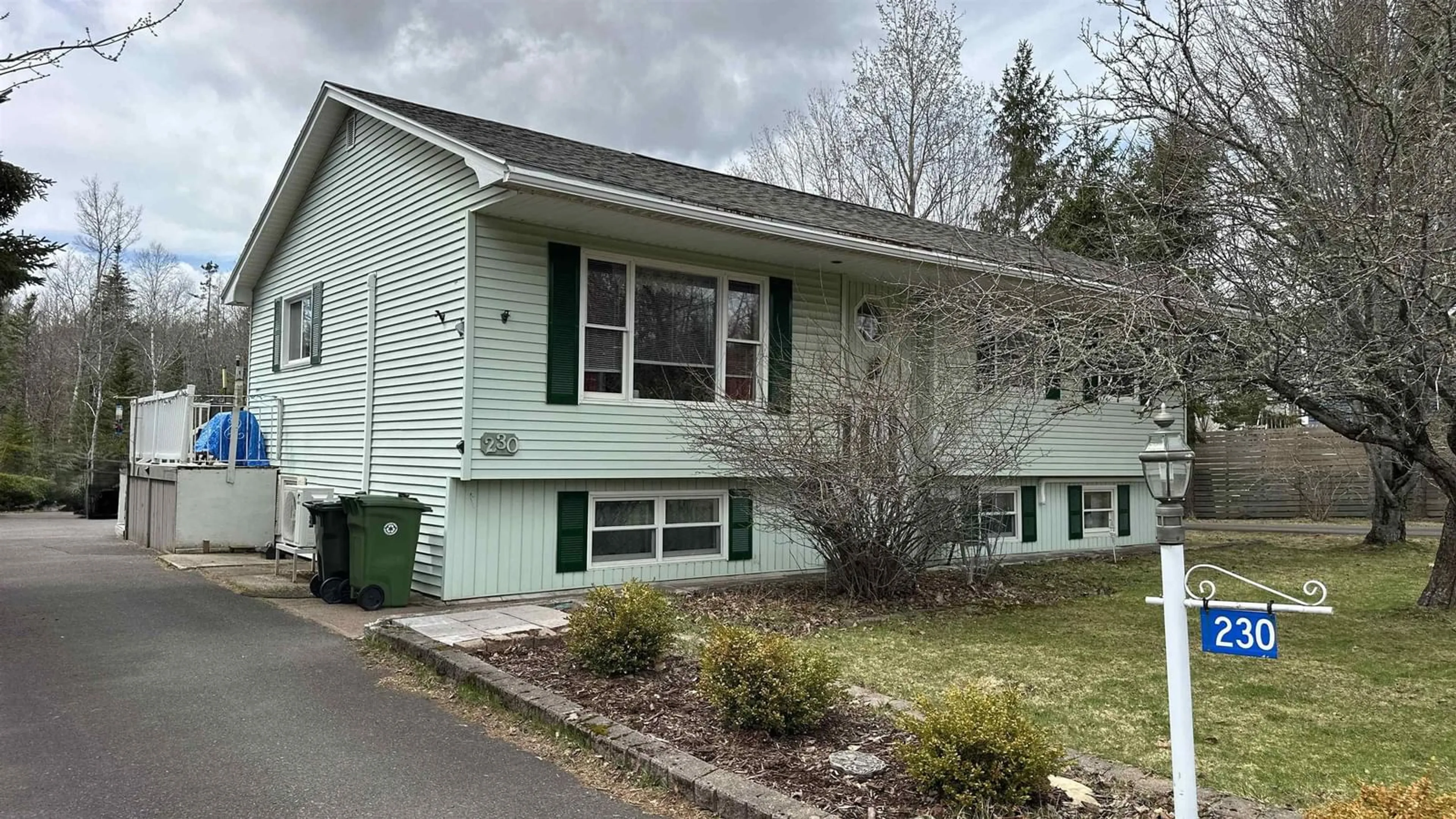 Home with vinyl exterior material, street for 230 Salmon River Rd, Valley Nova Scotia B6L 2S9