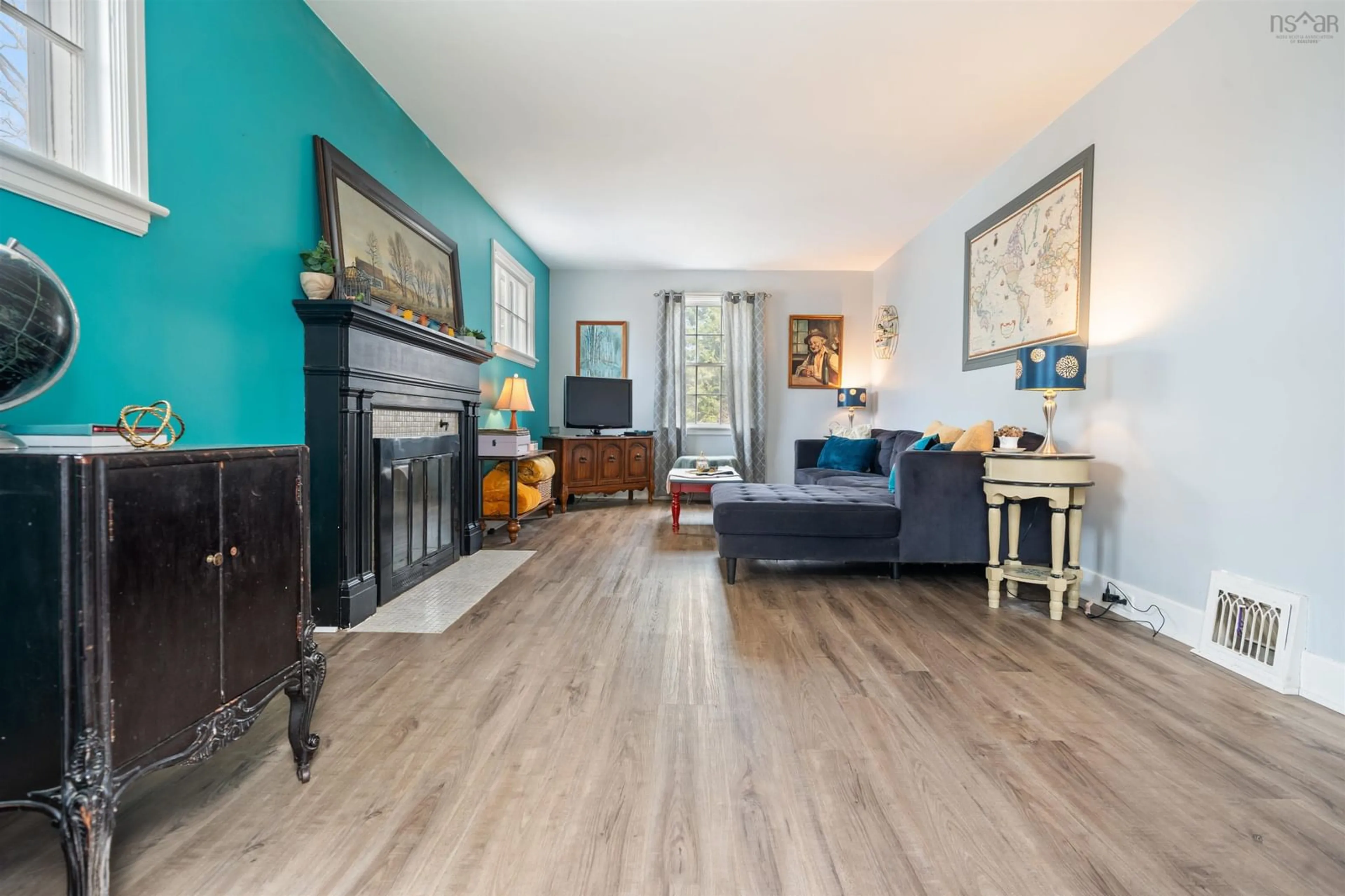 Living room with furniture, wood/laminate floor for 105 Lyman St, Truro Nova Scotia B2N 4S3