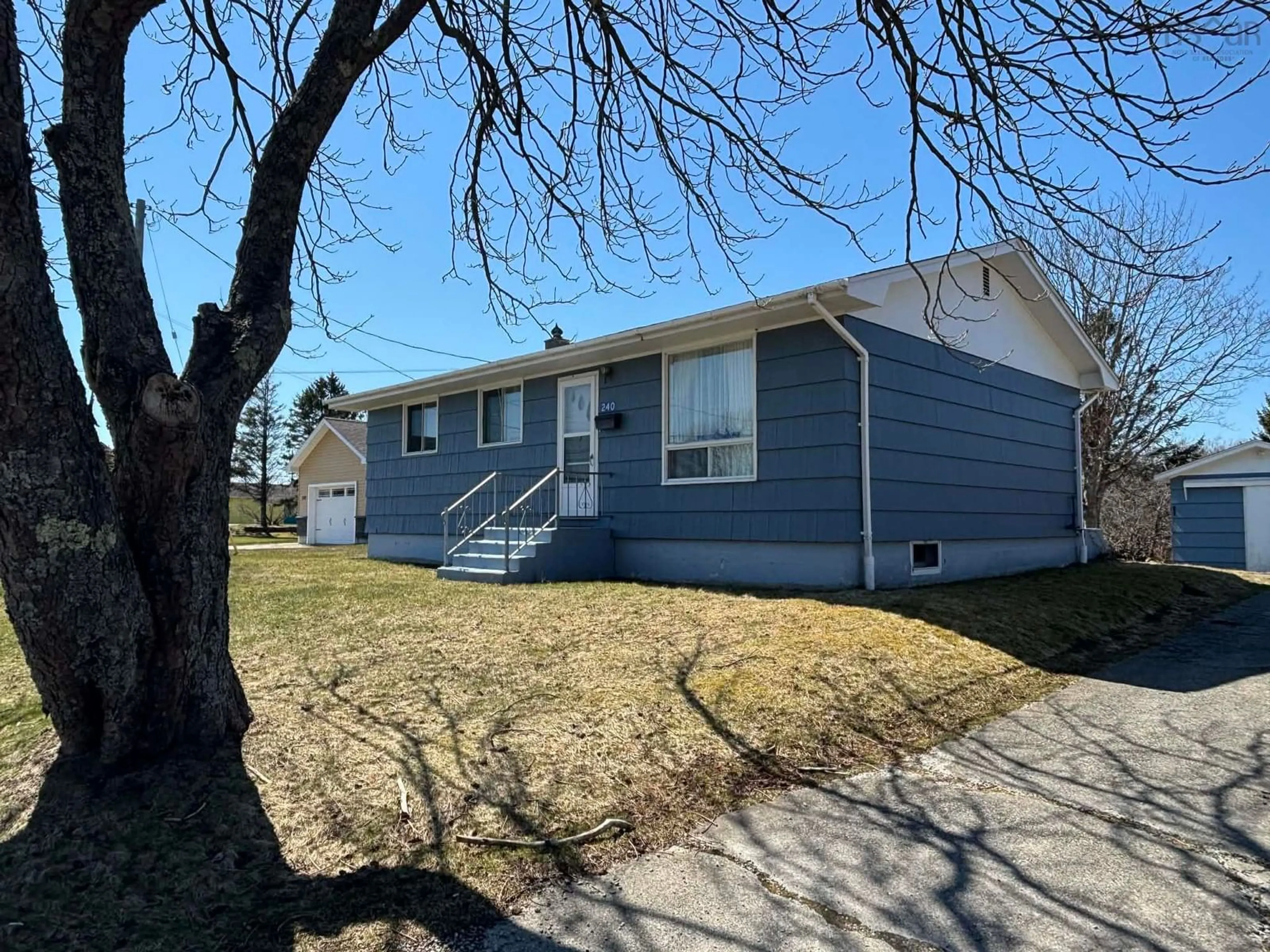 Home with vinyl exterior material, street for 240 Pleasant St, Yarmouth Nova Scotia B5A 2K4